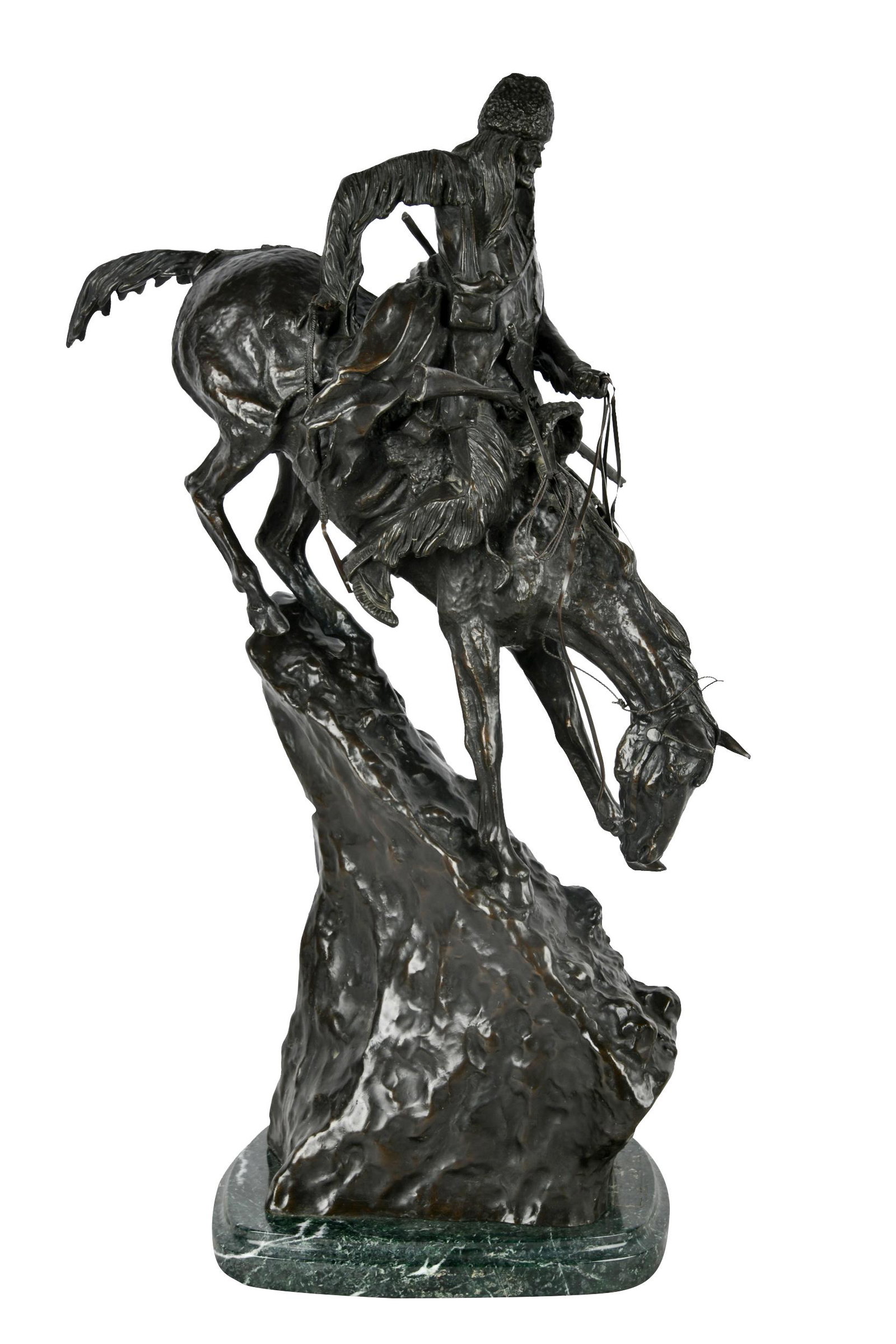 AFTER FREDERIC REMINGTON (1861 - 1909): "MOUNTAIN MAN": patinated bronze, signed "Copywrite by Frederic Remington"; mounted to a green marble plinth 29 inches high including base; the base 11 inches wide x 12 inches deep