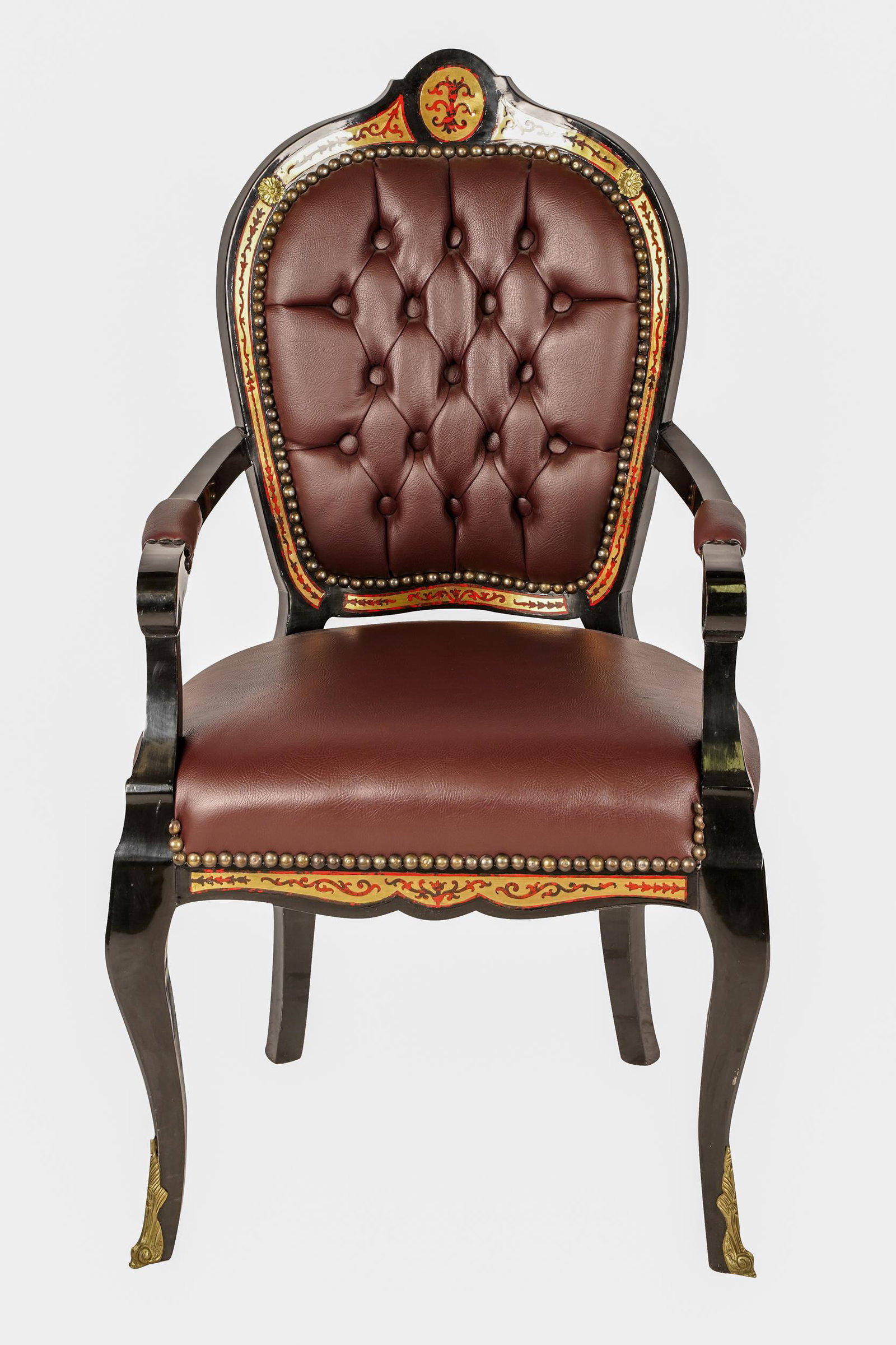 BOULLE-STYLE INLAID BLACK LACQUERED ARMCHAIR: after 1950, covered with maroon leather 24 1/2 inches wide; 22 inches deep; 44 inches high; seat height: 20 inches