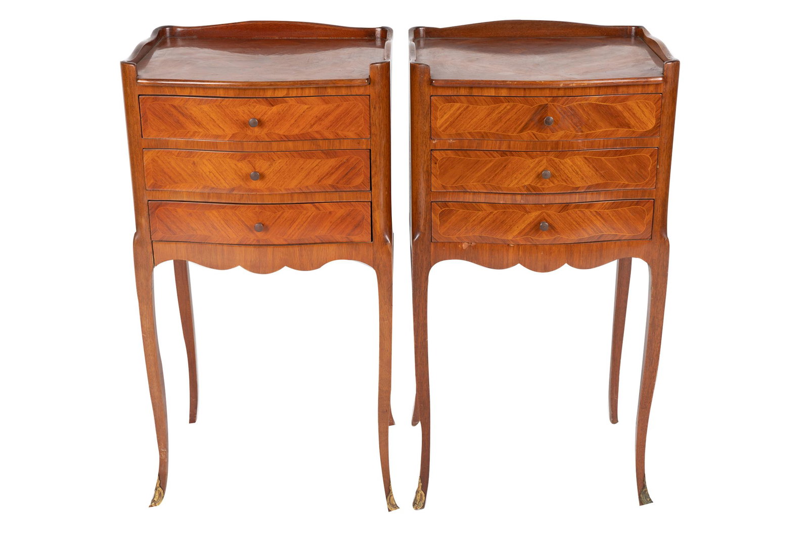 PAIR OF MARQUETRY PETITE COMMODES: each with three drawers Condition: front legs with sabots, back legs without; slight wear to one on front side 15 1/4 inches wide; 12 inches deep; 29 inches high