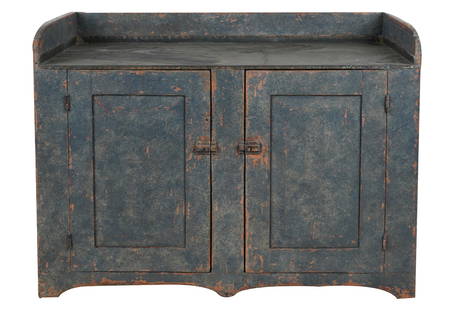 AMERICAN ZINC-TOP BLUE-PAINTED SERVER: with a pair of hinged doors enclosing a white-painted interior with a shelf Provenance: The Estate of Judith Krantz, Bel Air Condition: with paint loss and wear throughout 43 inches wide; 19 1/2