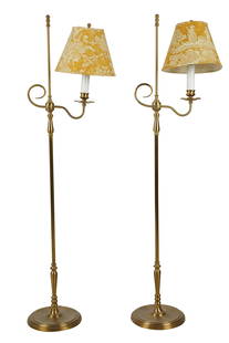 PAIR OF BRASS-FINISH METAL FLOOR LAMPS: with yellow and white floral fabric shades Provenance: The Estate of Judith Krantz, Bel Air each 52 1/2 inches high