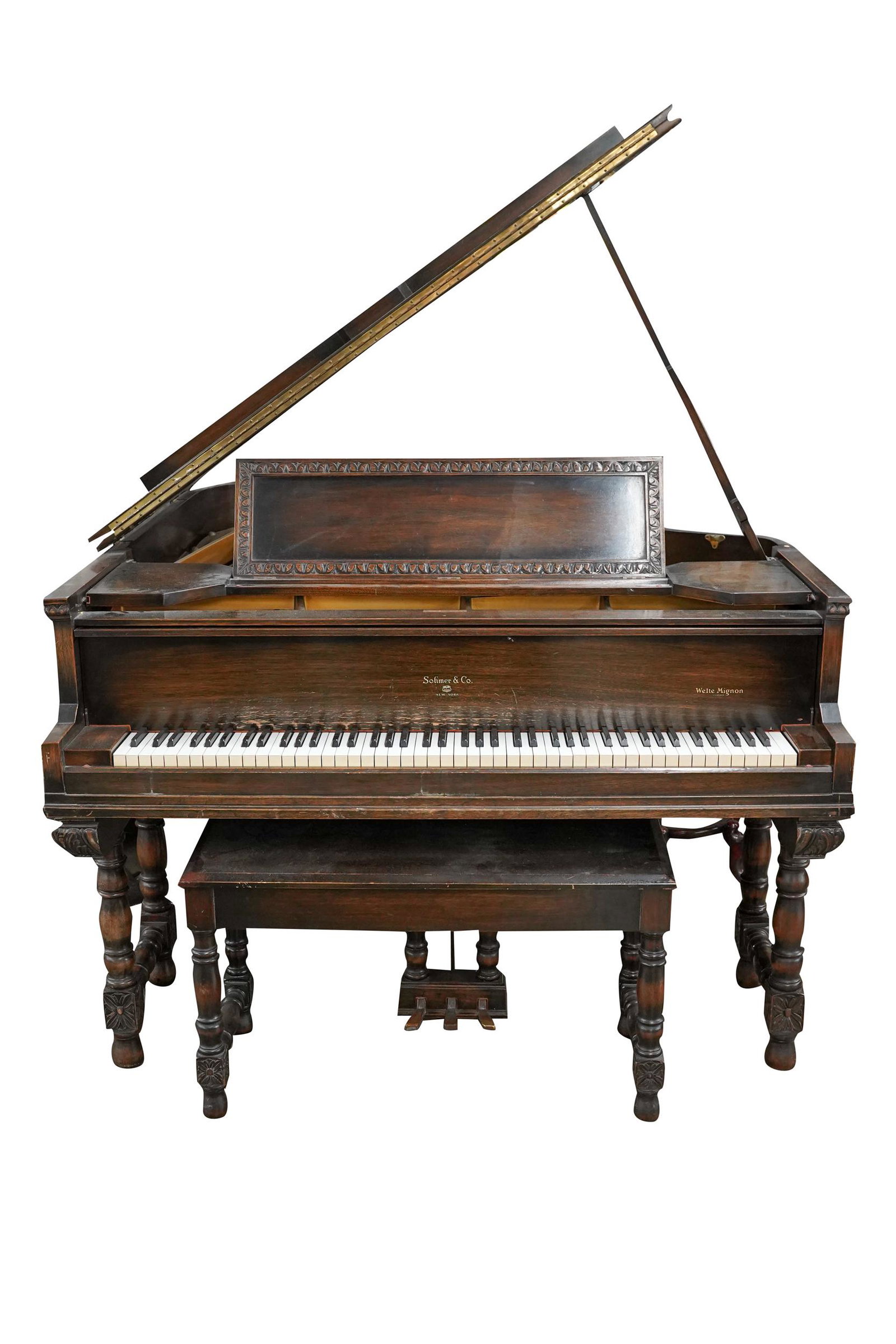 SOHMER & CO. MEDITERRANEAN-CASE WALNUT GRAND PIANO: circa 1920 - 1925, serial number 52752, #9B, with bench 57 inches wide; 68 inches deep; 38 1/2 inches high