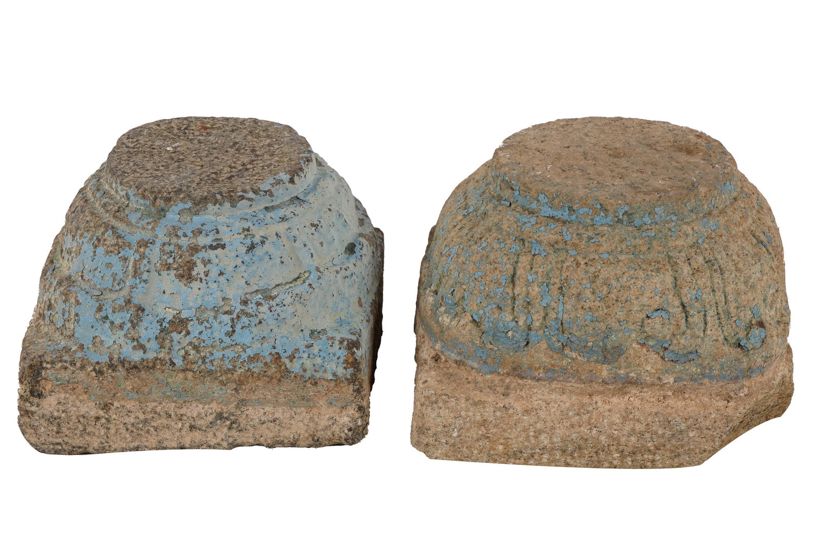 PAIR OF CARVED STONE TEMPLE FRAGMENTS: each with traces of blue paint the larger: 8 inches square; 6 inches high
