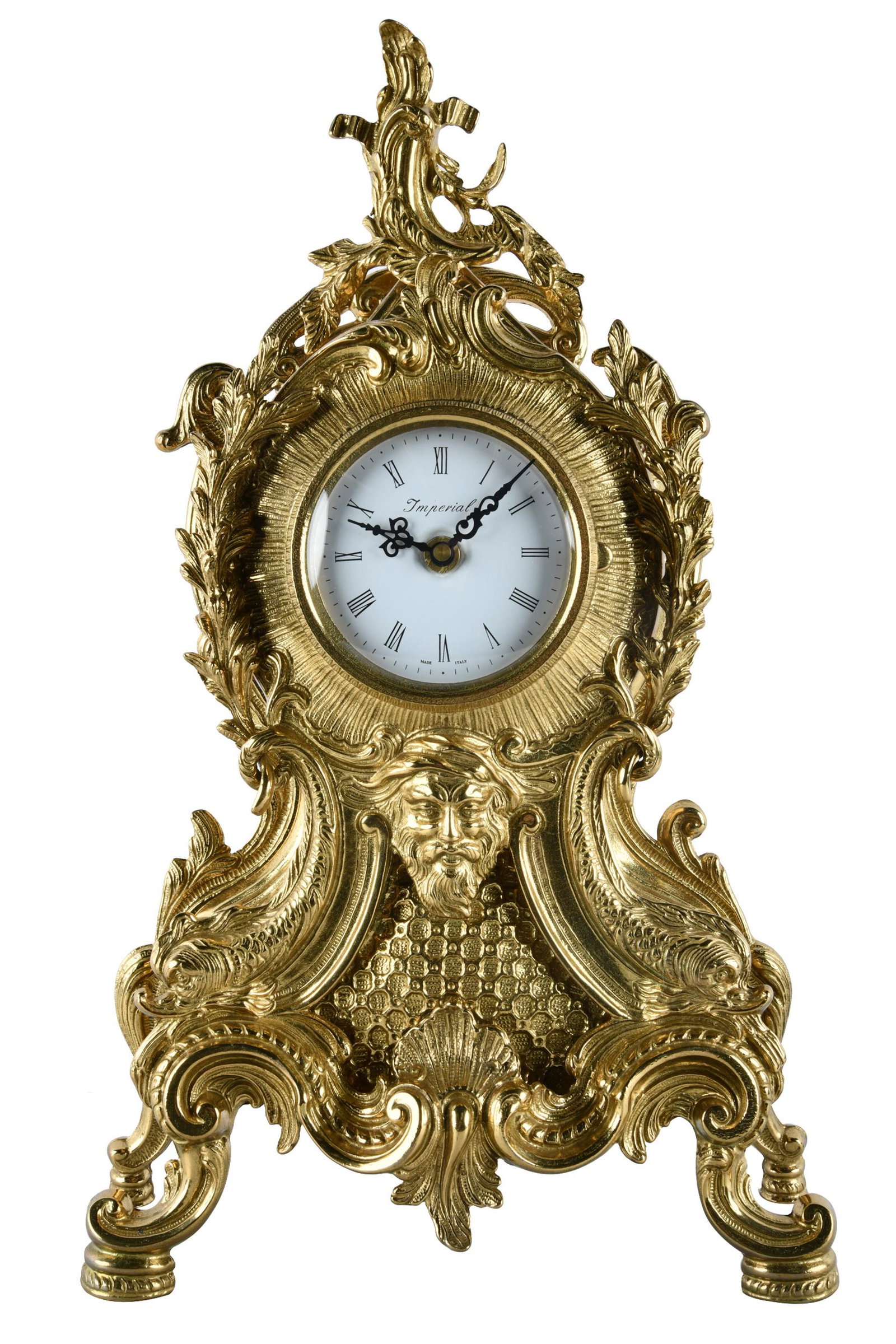 IMPERIAL GILT METAL MANTEL CLOCK: in the Louis XV style Provenance: The Ferrari-Carano Winery Estate Villa Fiore, Healdsburg 19 inches high