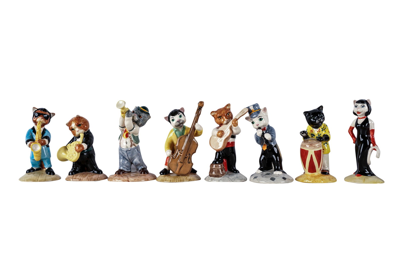 BESWICK PORCELAIN CAT BAND: black printed factory marks, comprising: 'Feline Flamenco', 'Ratcatcher Bilk', 'Purrfect Pitch', 'Bravura Brass', 'Calypso Kitten', 'Catwalking Bass', 'Trad Jazz Tom', and 'One Cool Cat' [8 pieces] th
