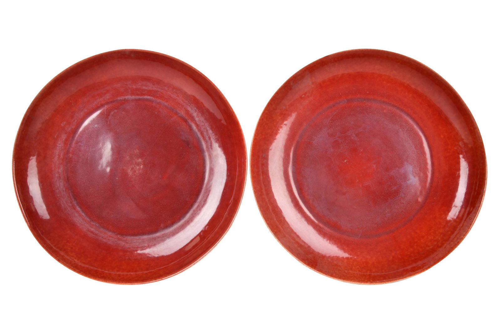 PAIR OF OXBLOOD GLAZED CERAMIC CHARGERS (1 of 8)