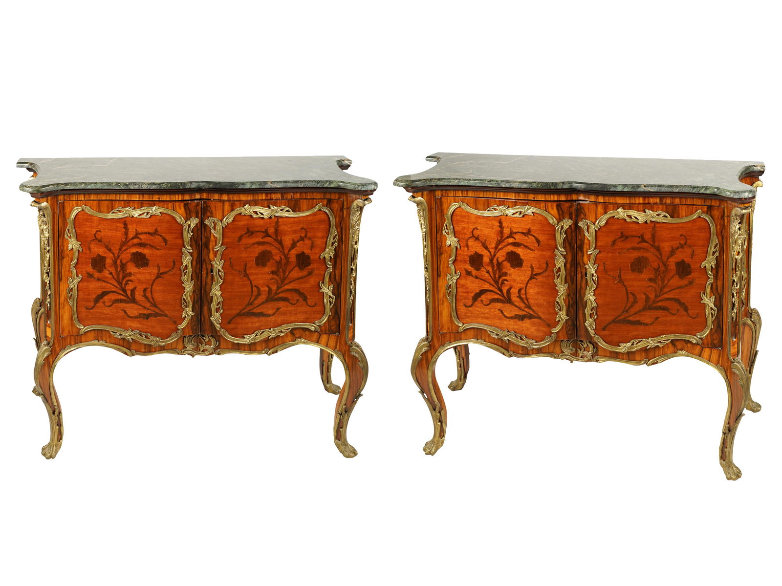 PAIR OF FRENCH MARQUETRY INLAID COMMODES: with gilt bronze ormolu and claw form sabots, each with two doors and green marble tops, doors reveal single shelf Condition: each with key; slight bubbling to left side veneer on one; one with shelf;
