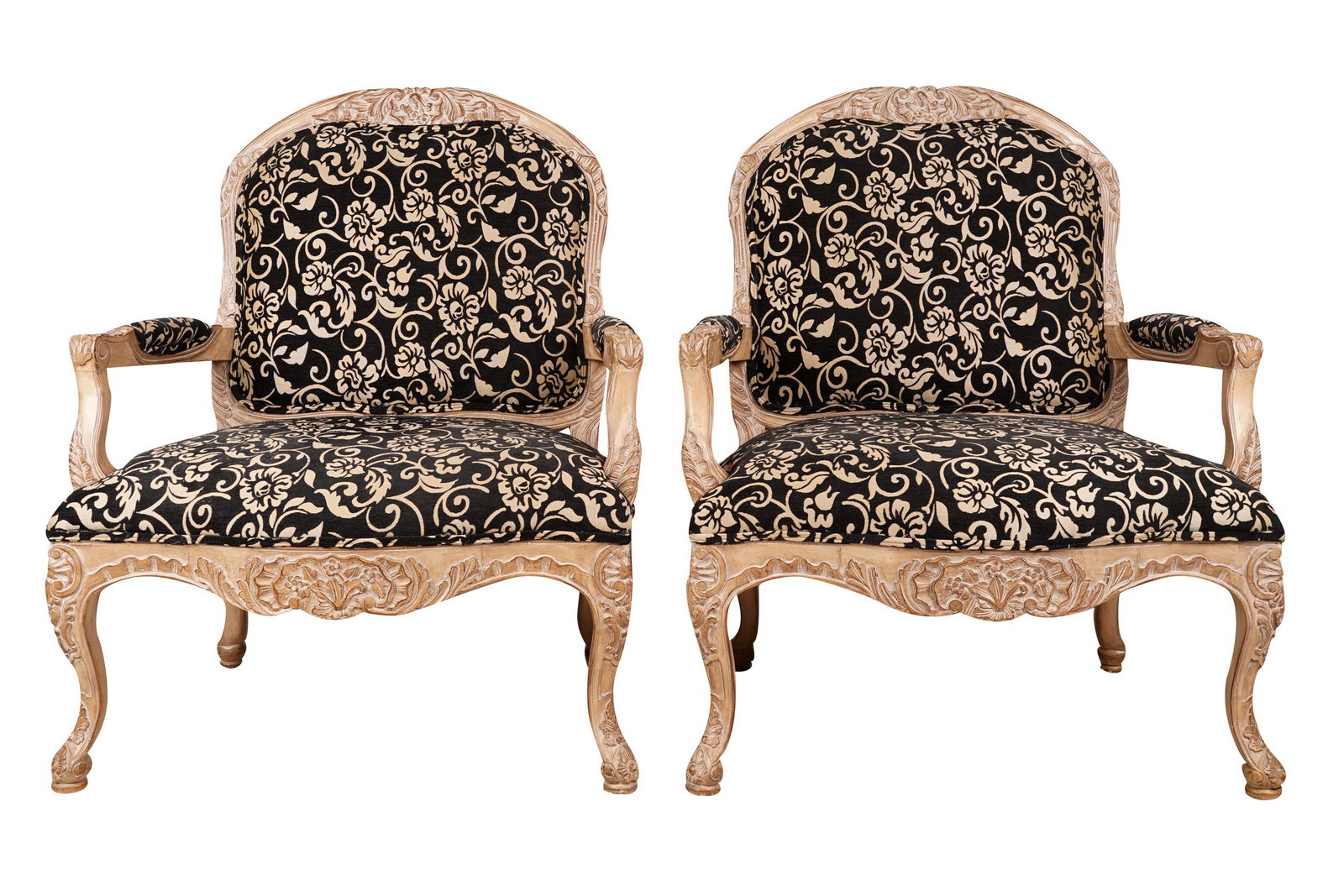 PAIR OF KREISS FAUTEUILS: with black and white upholsterly 34 inches wide; 34 inches deep; 42 inches high