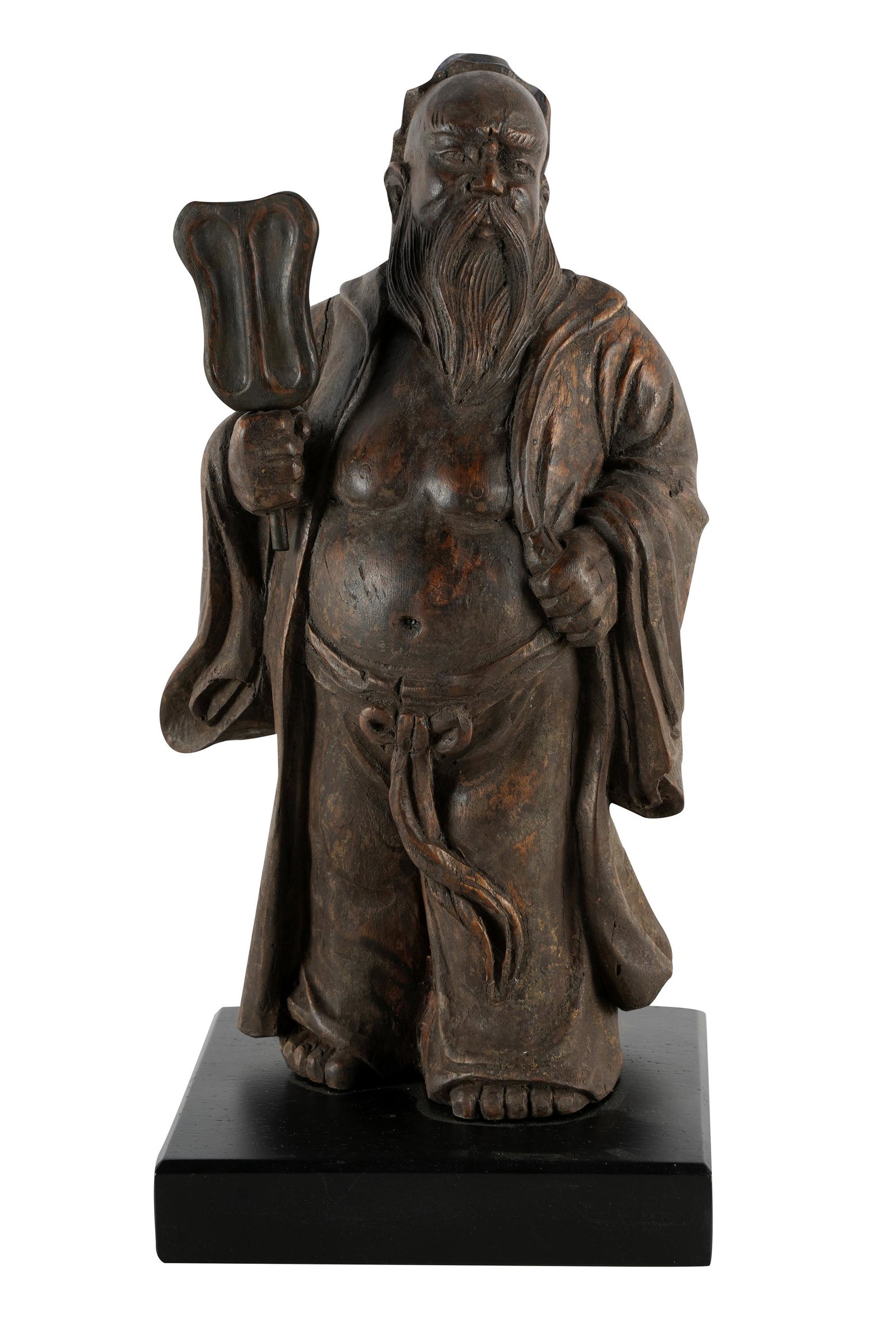CHINESE CARVED WOOD FIGURE OF AN ELDER: mounted to an ebonized wood base; 11 1/2 inches high