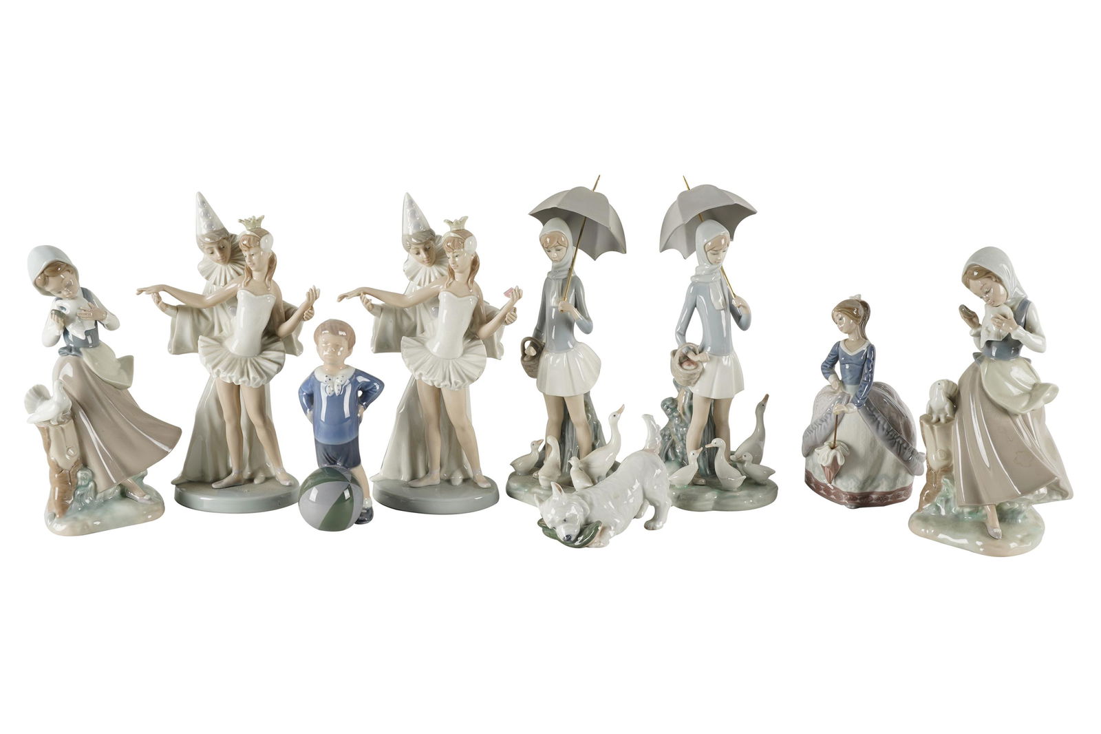 NINE PORCELAIN FIGURINES (1 of 16)