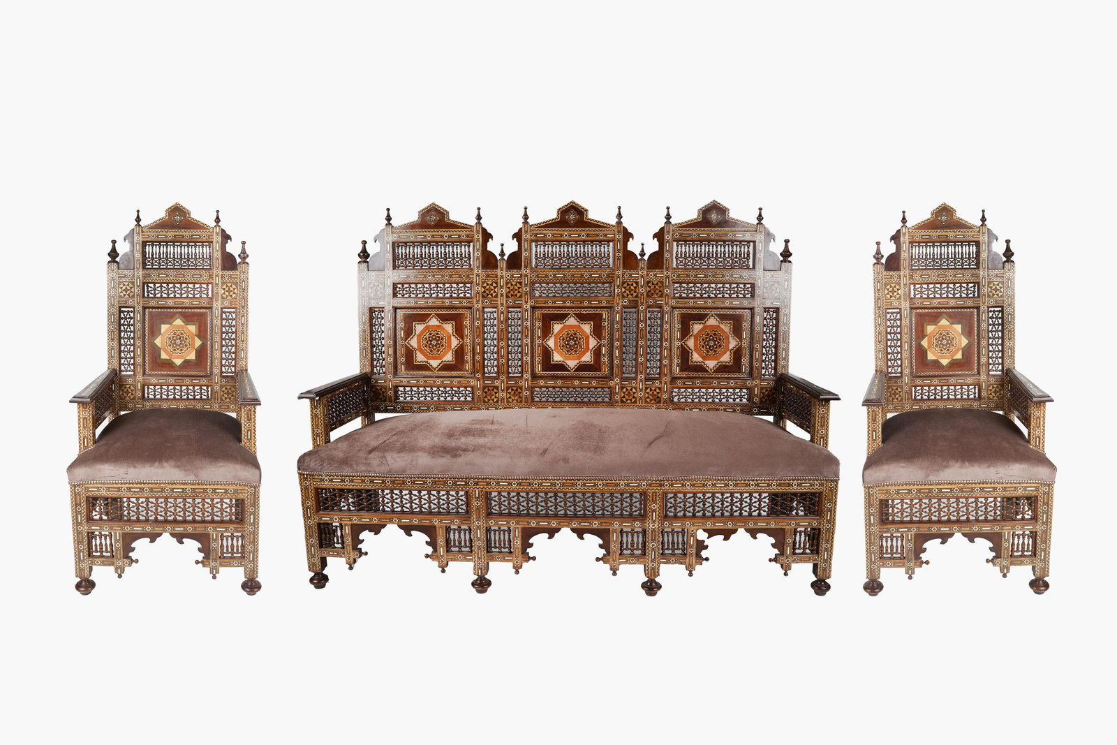 MOORISH STYLE INLAID THREE-PIECE SALON SUITE: comprising: two armchairs (25 1/2 inches wide; 24 inches deep; 56 inches high; seat height: 21 inches), and one sofa (74 1/4 inches wide; 23 1/2 inches deep; 56 inches high); Condition: with some spli