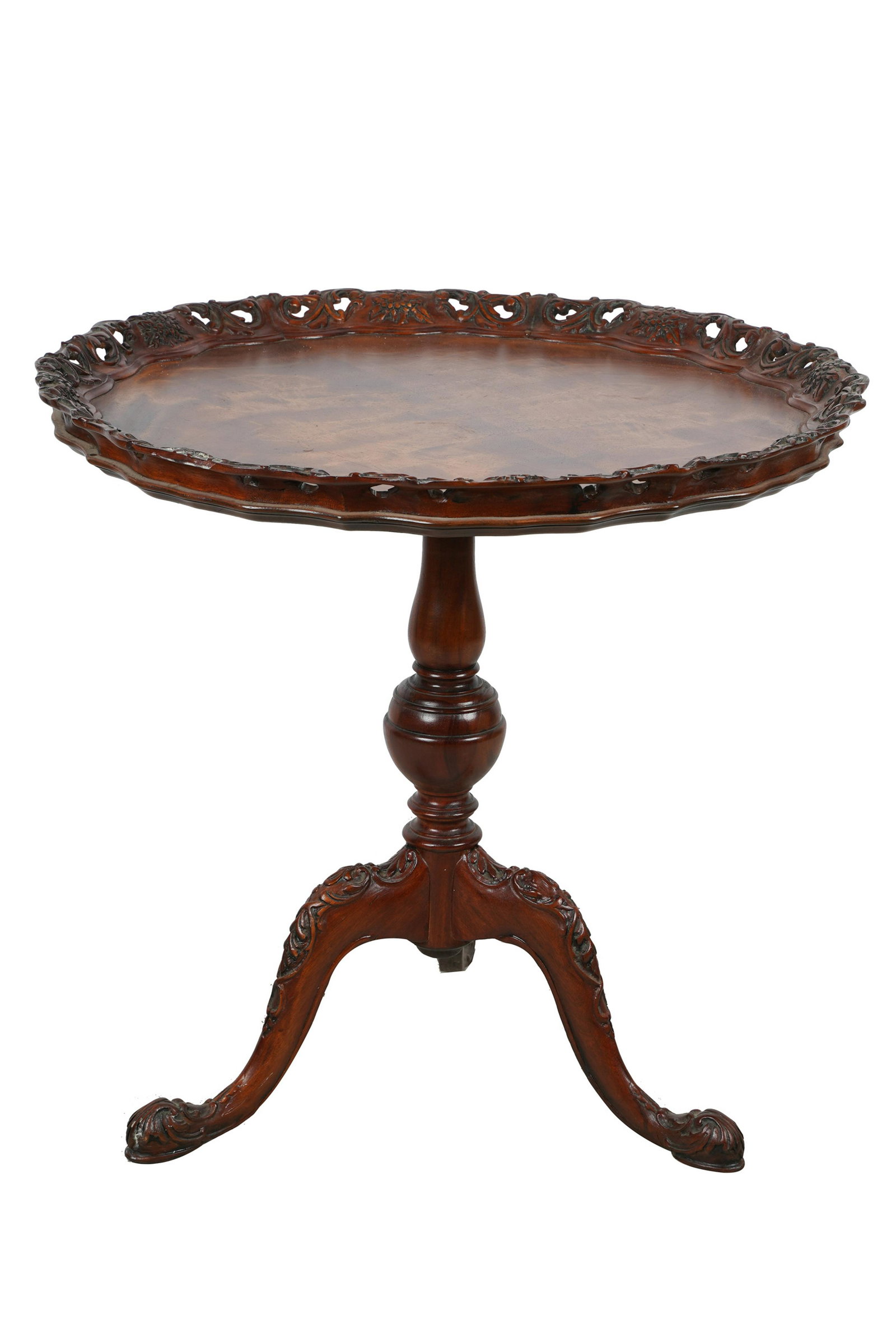 MAHOGANY TEA TABLE: with a pierced gallery rim; 30 inches diameter; 29 inches high