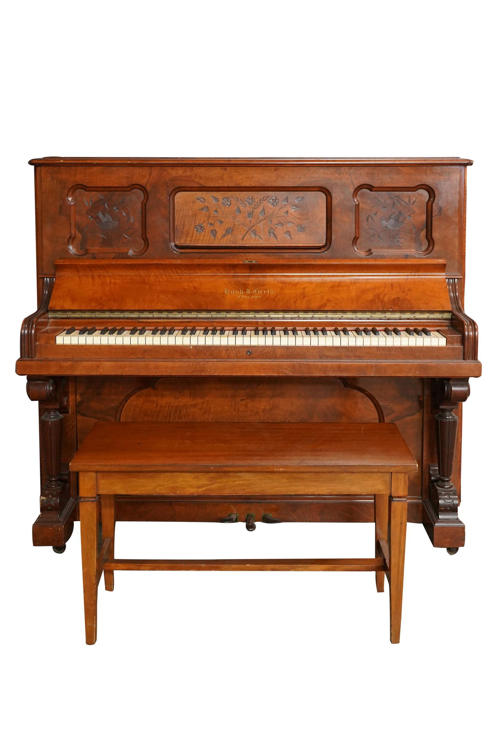 BUSH & GERTS, CHICAGO: UPRIGHT PIANO: serial number 9754; with associated bench of a later date; Provenance: The Estate of Bertha Hernandez, San Marino CA; 62 inches wide; 28 inches deep; 53 inches high