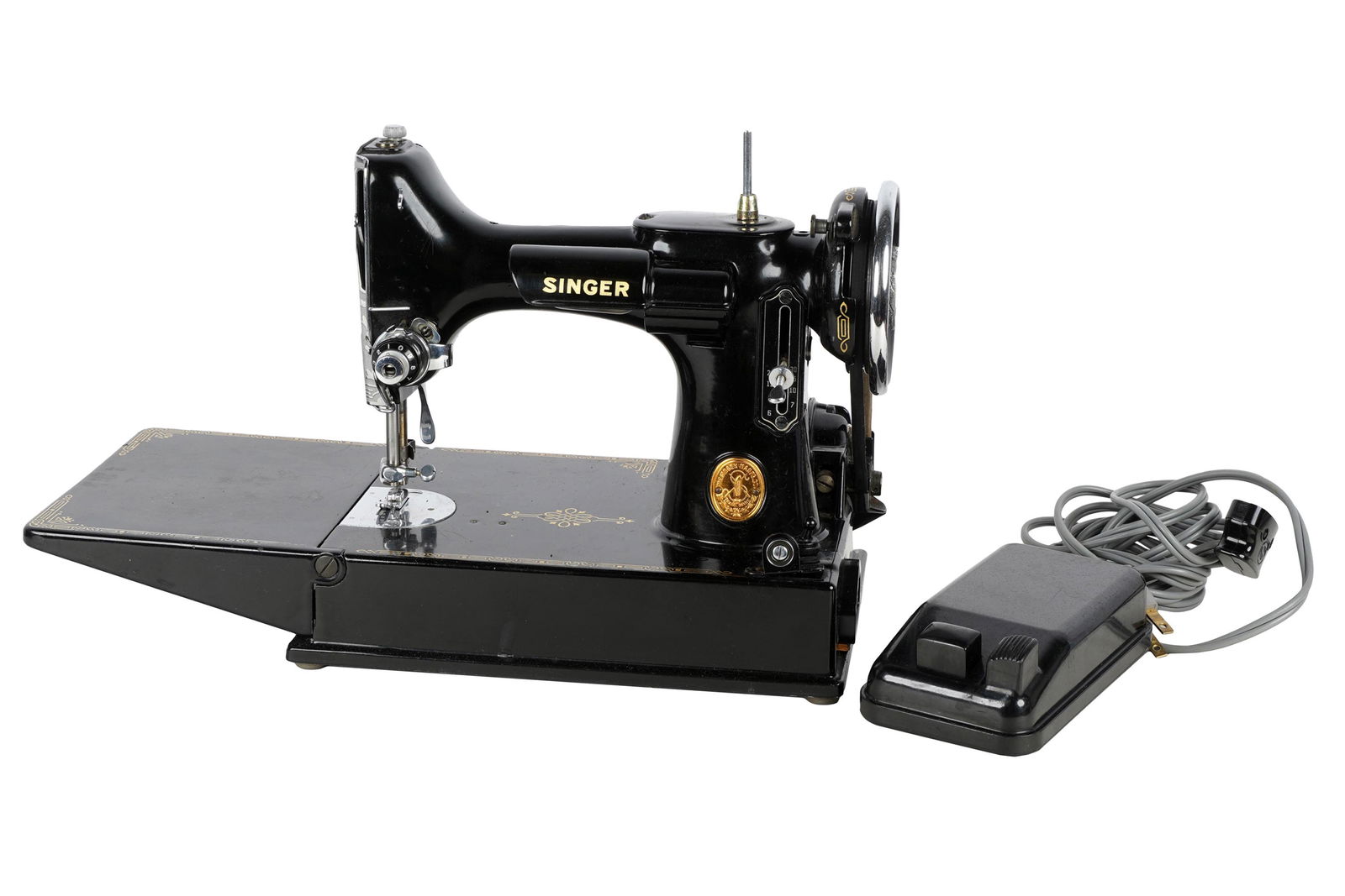 SINGER PORTABLE SEWING MACHINE: serial number AF754021; in fitted box, with pedal; Condition: working condition untested and unknown: the case; 13 inches wide; 8 inches deep; 12 inches high