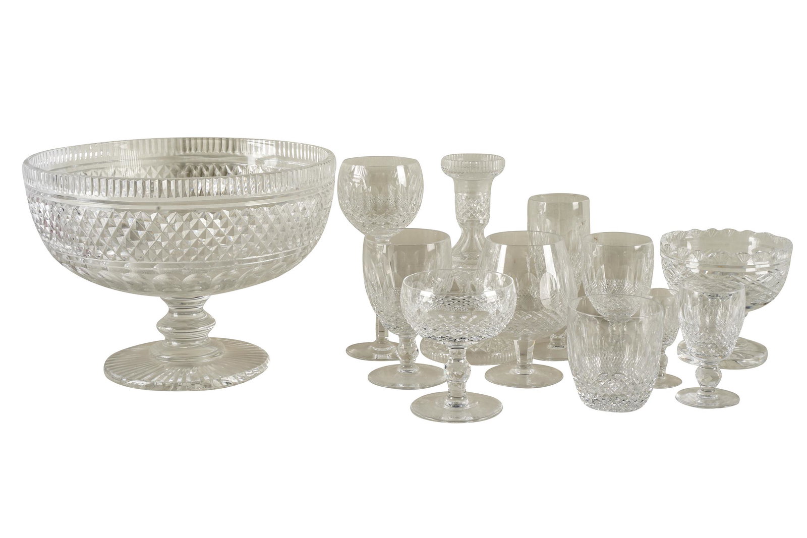 WATERFORD: 'COLLEEN' CRYSTAL DRINKS SERVICE: with maker's marks, comprising: one punch bowl (10 3/4 inches diameter; 8 inches high); 12 wine glasses (7 3/8 inches high ); 12 champagne flutes (6 inches high ); 12 clarets (4 3/4 inches high); 12 w