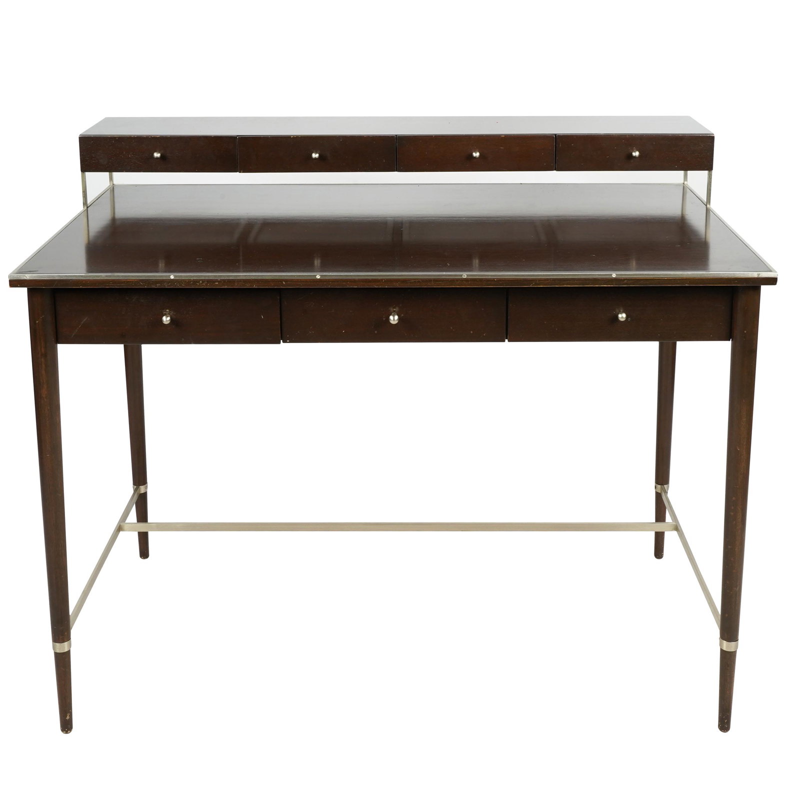 PAUL MCCOBB: METAL-MOUNTED DESK: label to interior of drawer; Condition: surface scratches to top from use, feet with scratching; 42 inches wide; 24 inches deep; 34 1/2 inches high
