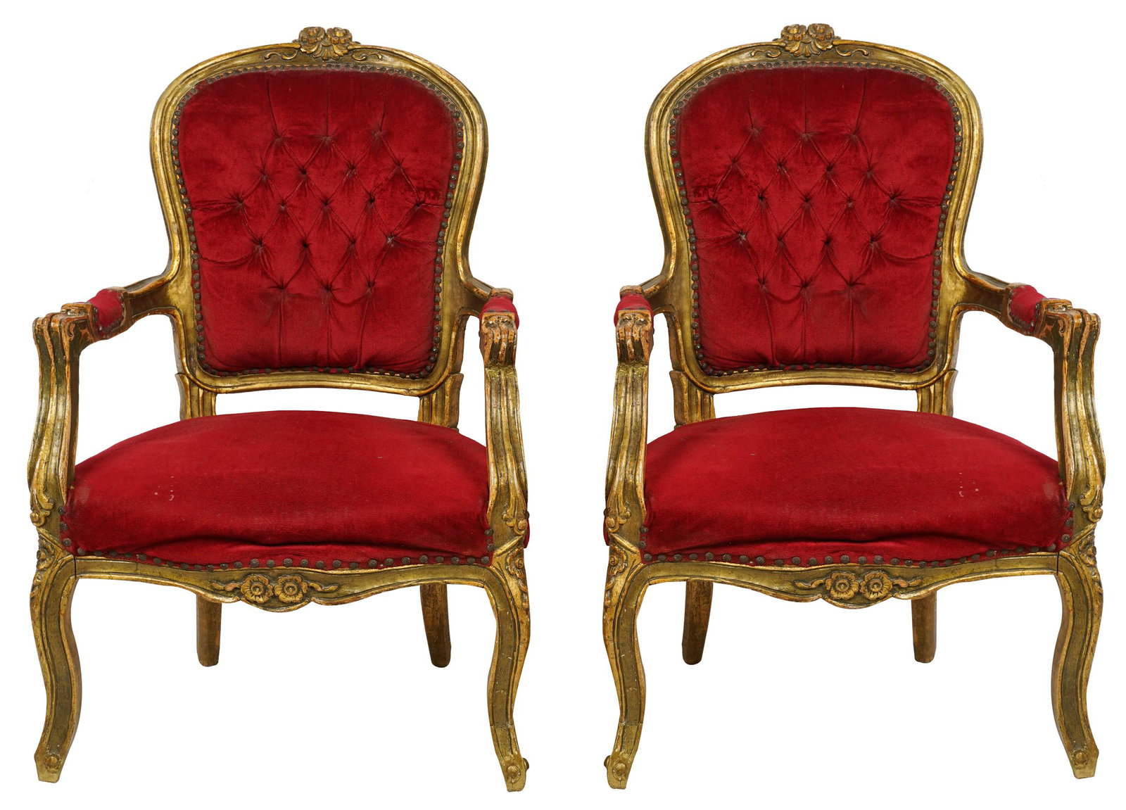 PAIR OF CONTINENTAL CARVED GILTWOOD ARMCHAIRS: with red velvet upholstery; Condition: fabric with areas of wear; 24 1/2 inches wide; 21 inches deep; 38 inches high; seat height: 16 inches