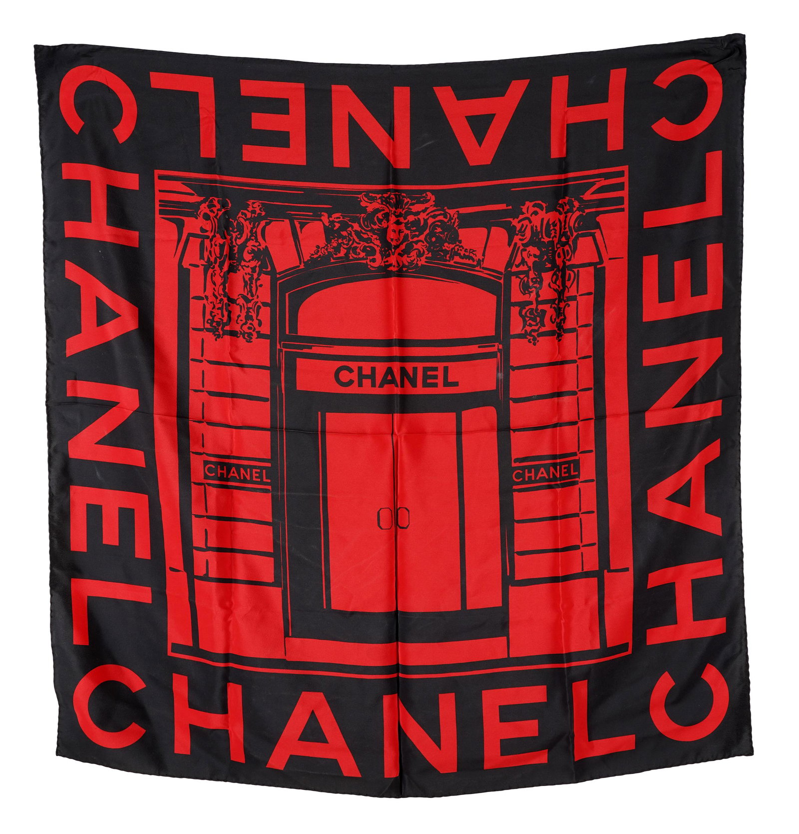 CHANEL RED & BLACK SILK SCARF: depicting a storefront ; Provenance: Estate from The Wilshire, Los Angeles; 33 inches square