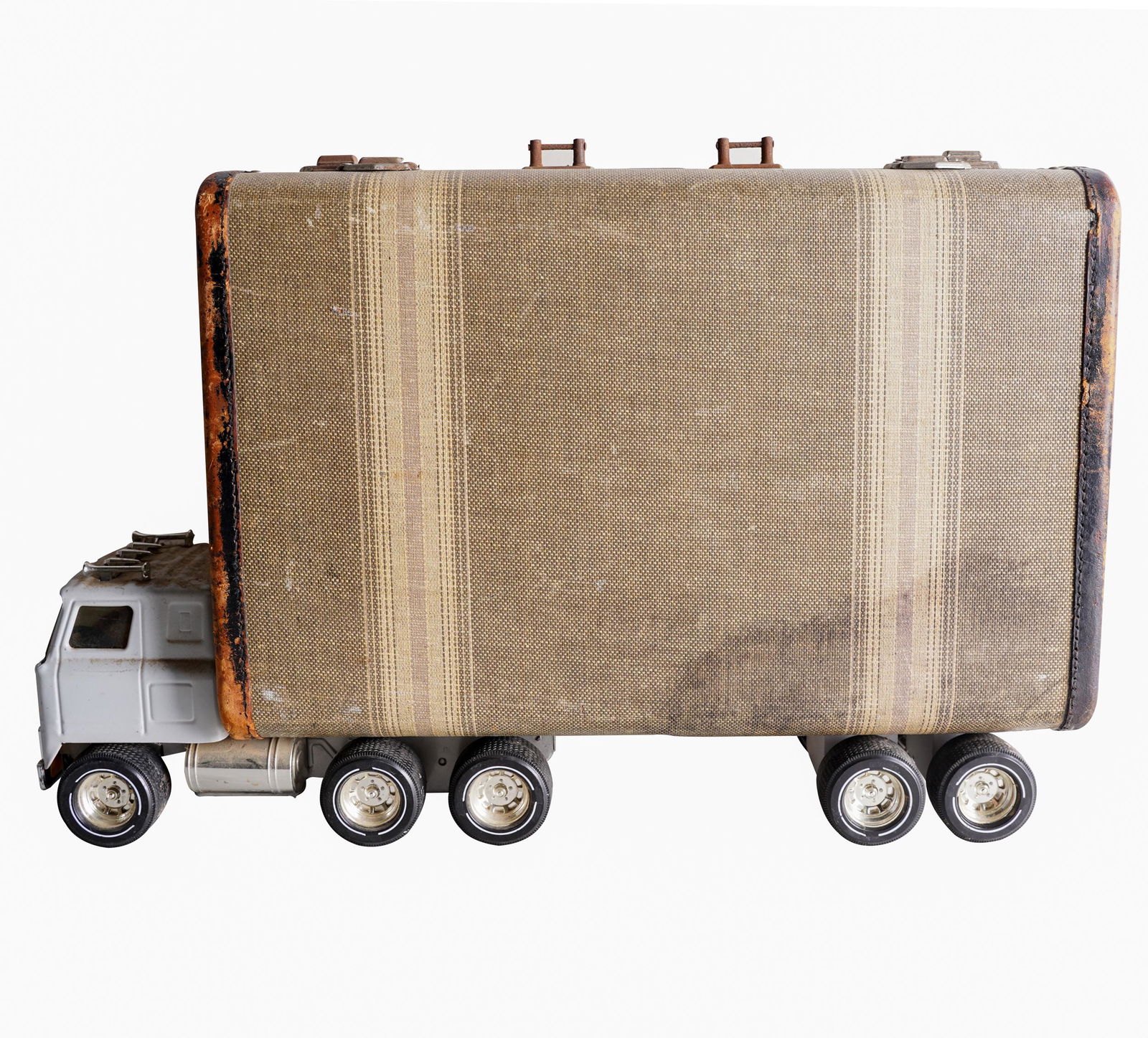 BRUCE HOUSTON (B. 1937): UNTITLED (SUITCASE ON TRUCK) (1 of 11)