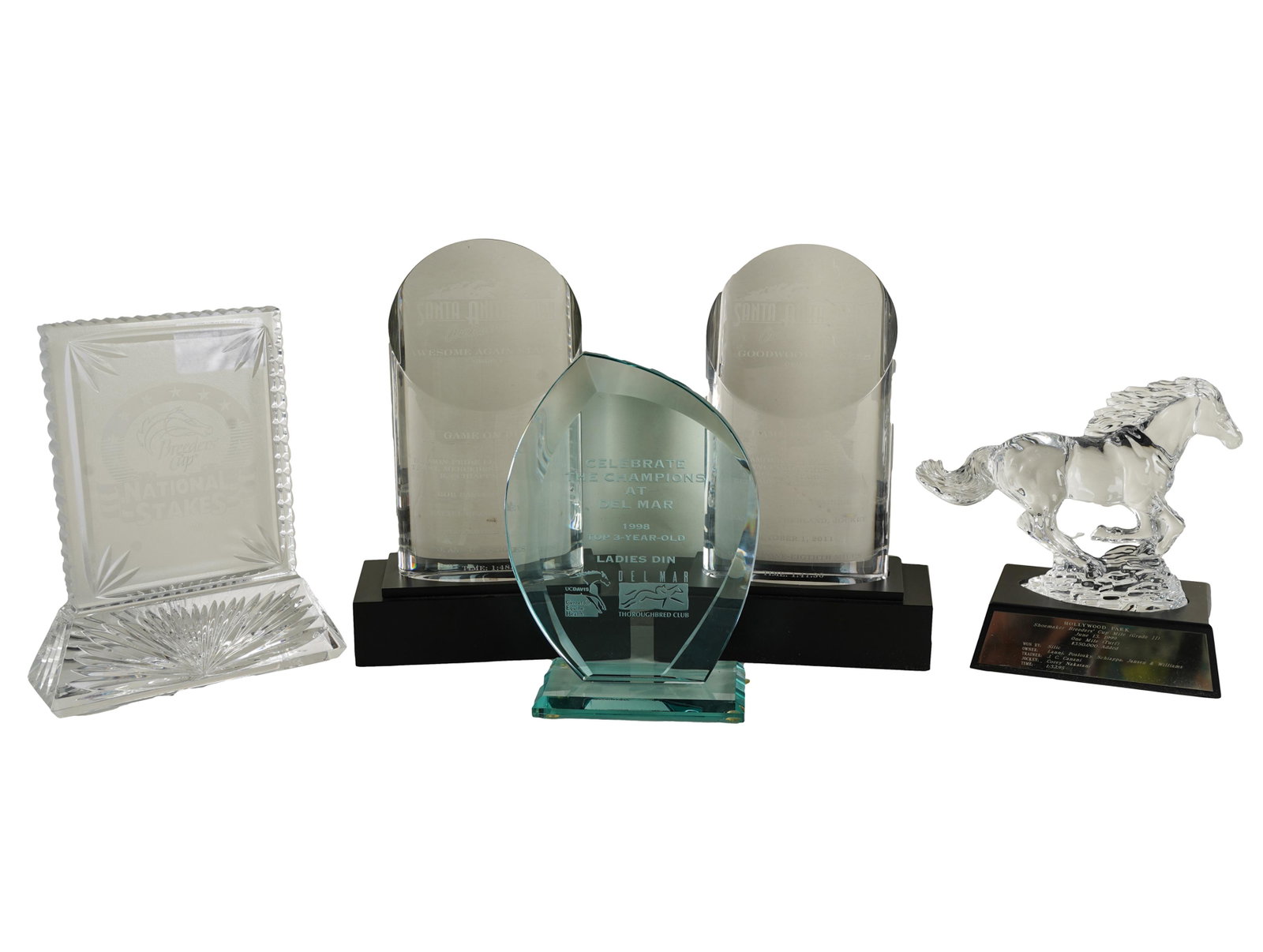 COLLECTION OF GLASS HORSE RACING TROPHIES: comprising: Breeder's Cup National Stakes (Waterford), Celebrate The Champions at Del Mar, Hollywood Park (with Waterford horse) and two Santa Anita Park Stakes (Tiffany & Co.) Provenance: The Terry &