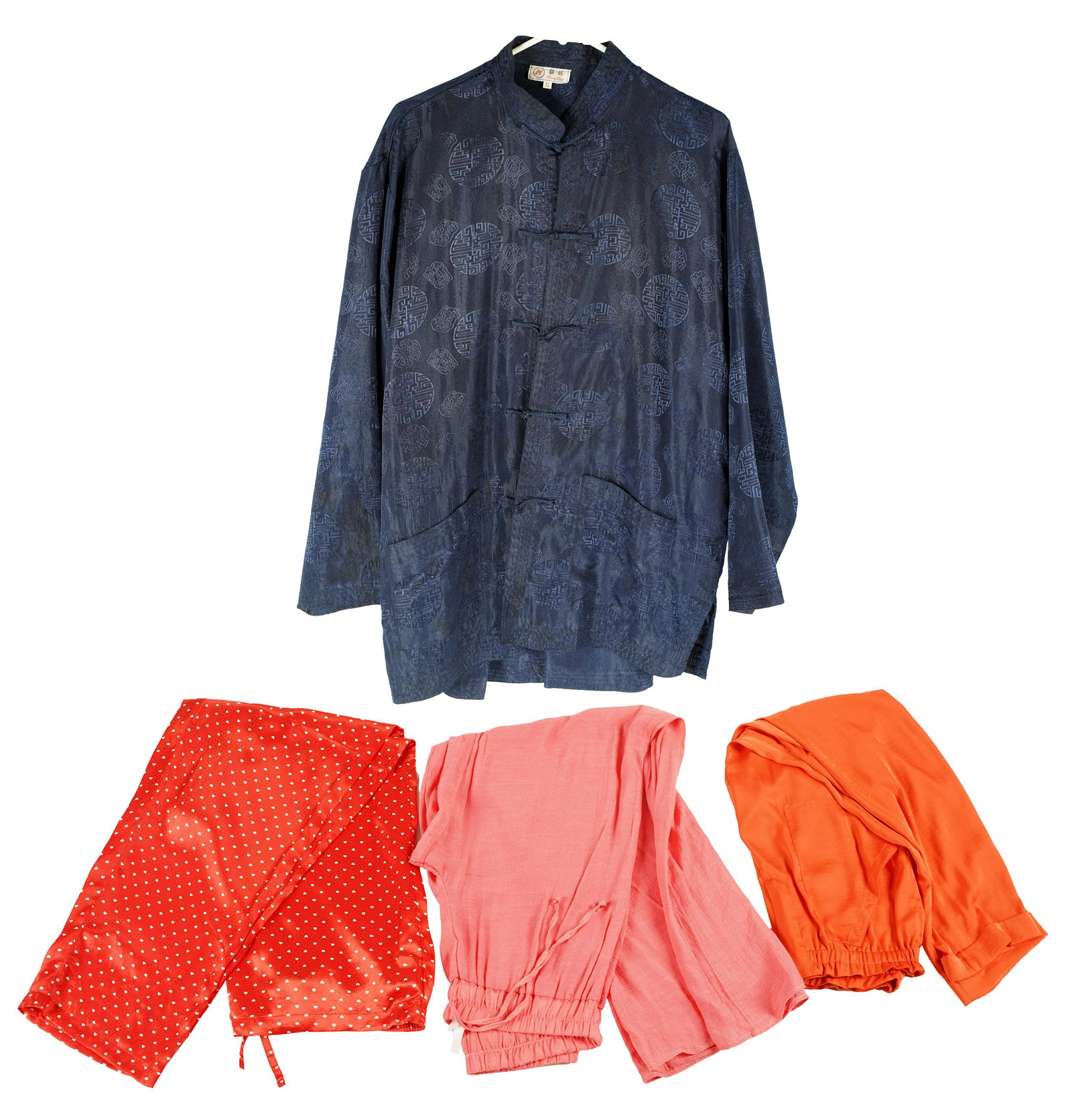 CAROL CHANNING GROUP OF LOUNGEWEAR: Comprising a Lian Lin Asian style navy top and matching pants, size XL (elastic waist of pants brittle); a pair of Perry Ellis Portfolio red with hearts pattern 100% silk pants, size large; a pair of