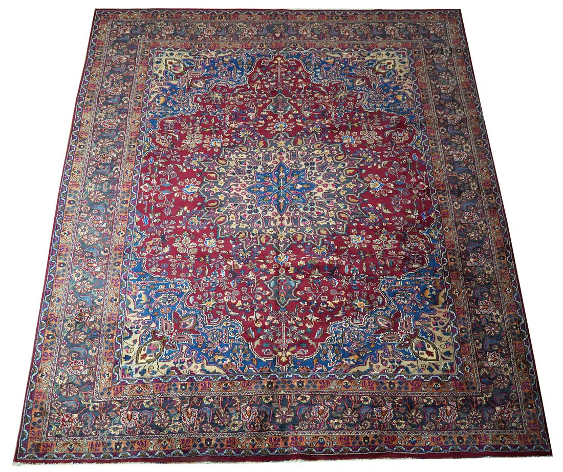 PERSIAN AREA RUG: wool on cotton foundation; with red field; 12'9'' x 10'