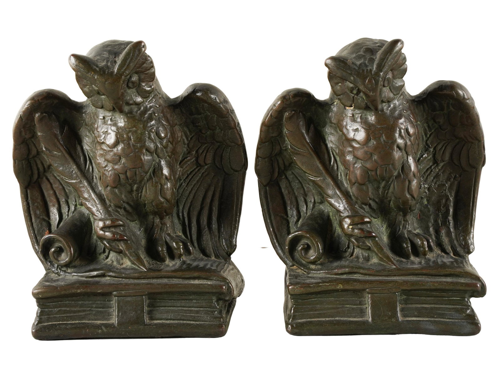 PAIR OF BRONZE OWL-FORM BOOKENDS: one with "Armor Bronze" paper label to underside; Provenance: The Estate of Barry Tarlow, Los Angeles; 6 inches wide; 3 1/4 inches deep; 6 1/2 inches high