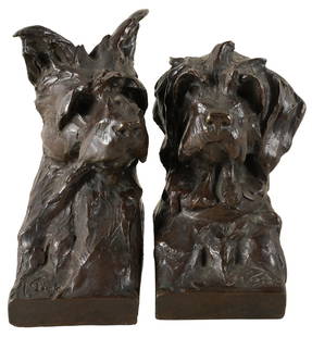 MAXIMILIEN LOUIS FIOT (1886 - 1953): DOG BOOKENDS: bronze with brown patination; signed in casting, Susse Freres, Paris foundry inscription, further inscribed "Cire Perdue" ; The Estate of Barry Tarlow, Los Angeles; 4 3/4 inches wide; 7 3/4 inches hig