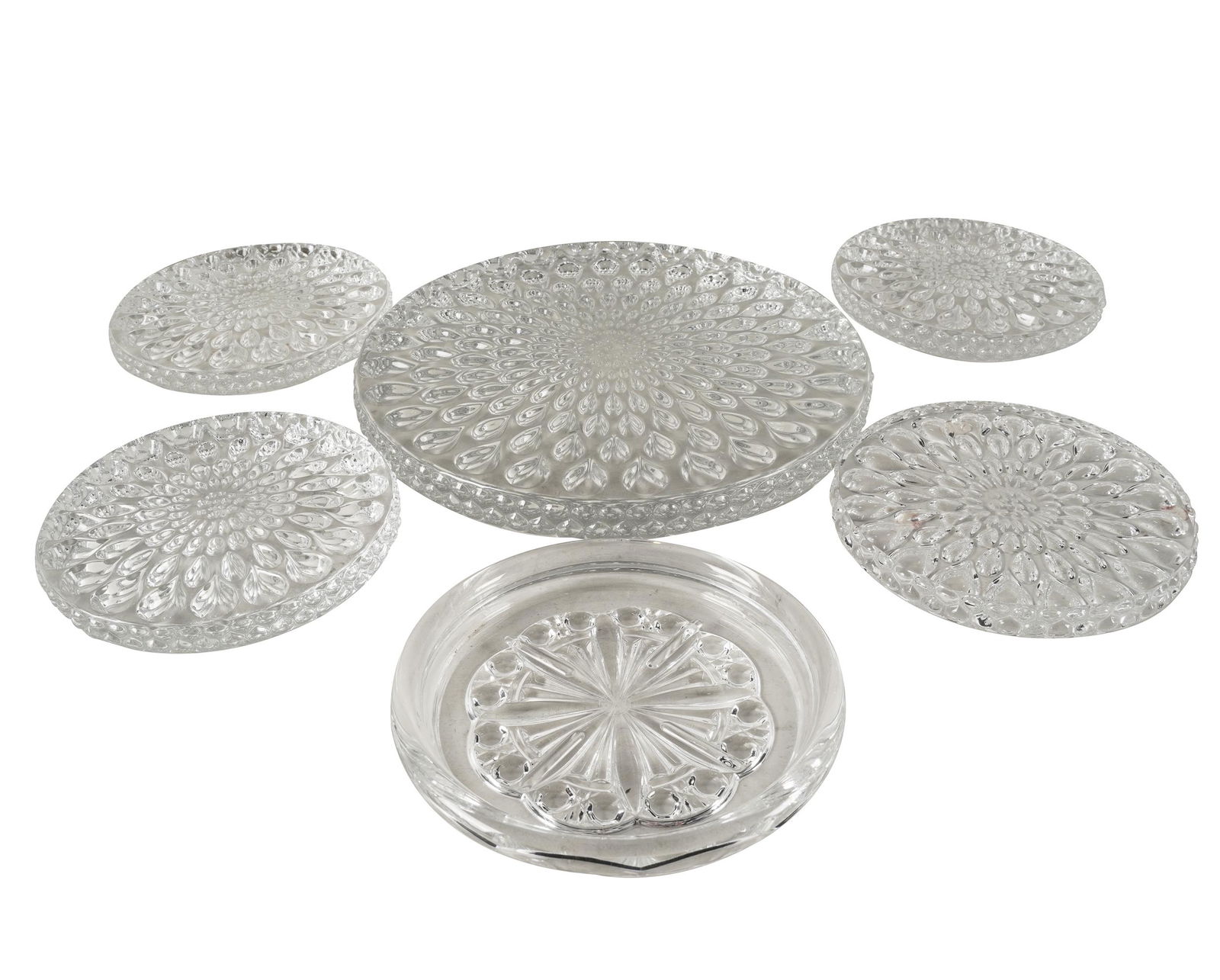 COLLECTION OF BACCARAT CRYSTAL TRIVETS: each stamped to underside; comprising twelve (5 1/4 inches diameter) and three (9 inches diameter); together with a wine coaster in a different pattern (5 1/2 inches diameter); Provenance: The Estate