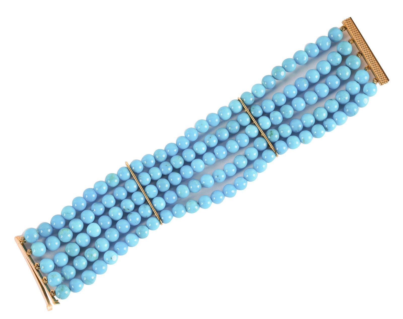 18 KARAT YELLOW GOLD & RECONSTRUCTED TURQUOISE BRACELET: containing 140 round, reconstructed turquoise beads measuring approximately 5.60 mm in diameter; 37.7 grams; 6 1/4 inches long