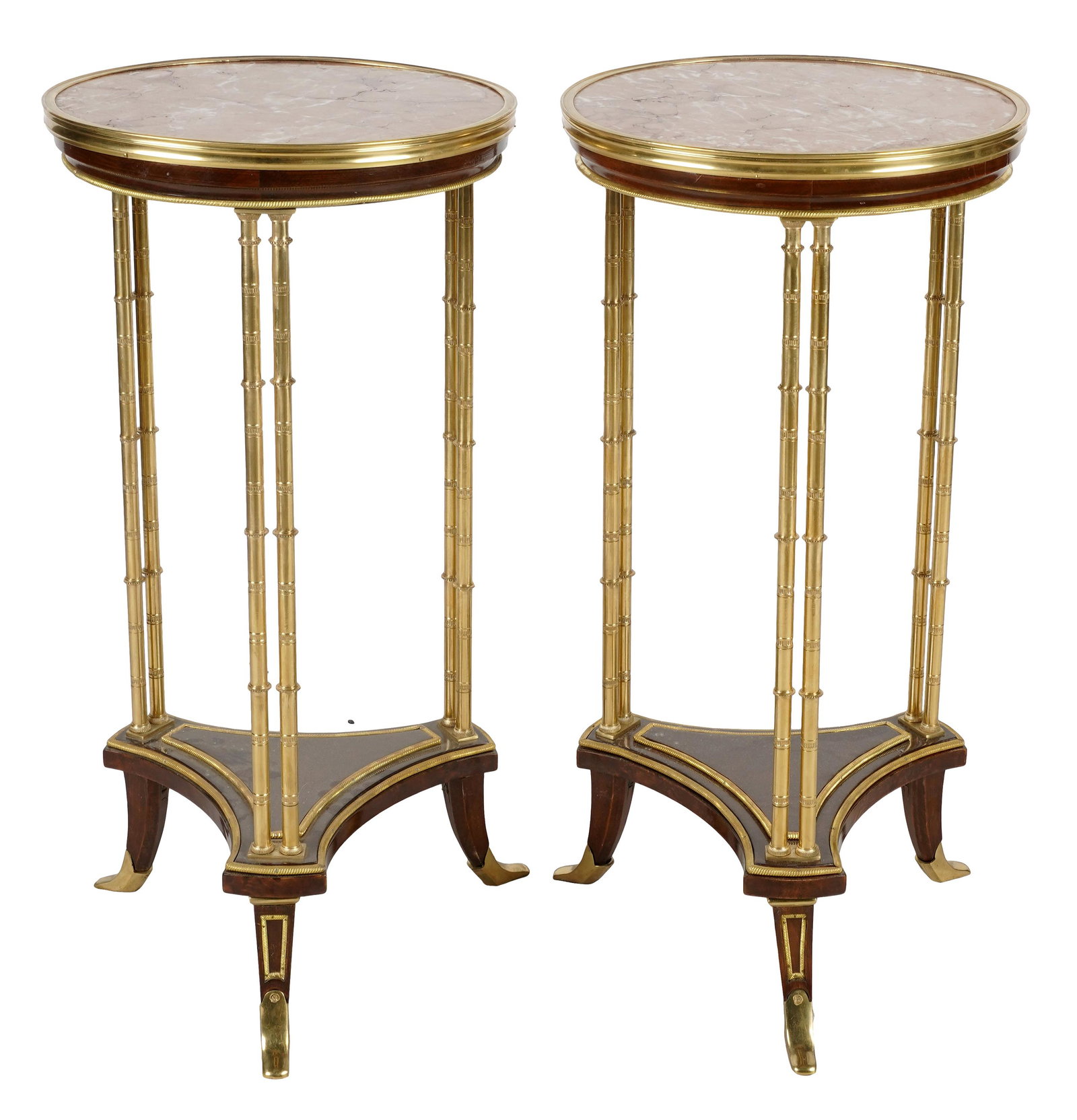 PAIR OF NEOCLASSIC GUERIDONS: with marble tops, gilt metal supports and feet; 14 1/4 inches diameter; 29 3/4 inches high