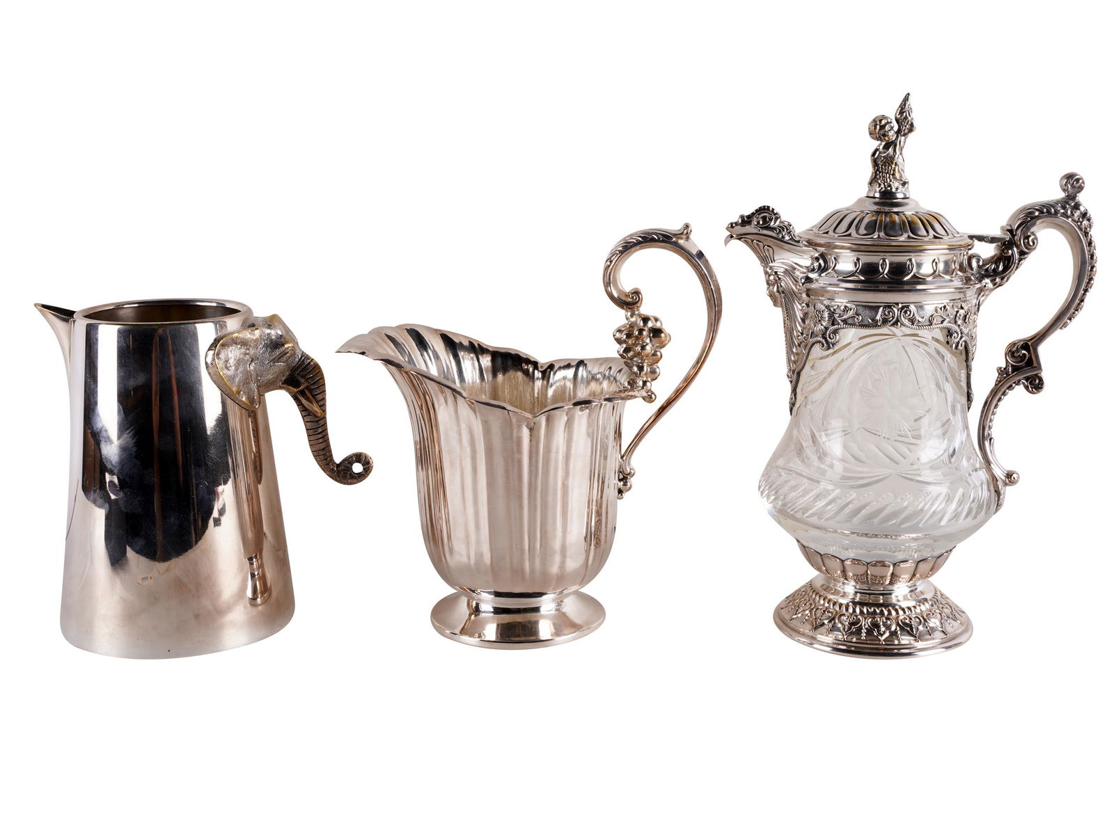 THREE SILVERPLATE PITCHERS (1 of 10)