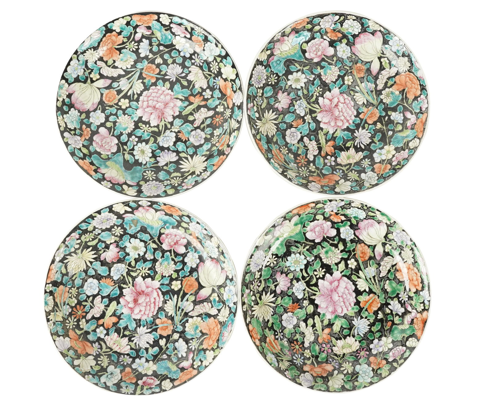 SET OF FOUR CHINESE FAMILLE NOIRE PORCELAIN DISHES: each with seal mark to underside; Provenance: Rose Tarlow Antiques, 1975; the Estate of Barry Tarlow, Los Angeles; 9 1/2 inches diameter;