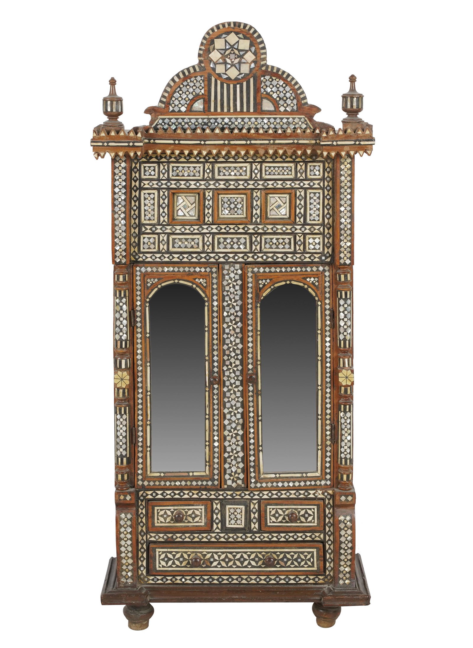 MOORISH-STYLE INLAID WOOD HANGING CABINET: Condition: losses to top molding and minor restorations throughout; wear to mirrored glass; 18 1/2 inches wide; 9 inches deep; 41 inches high