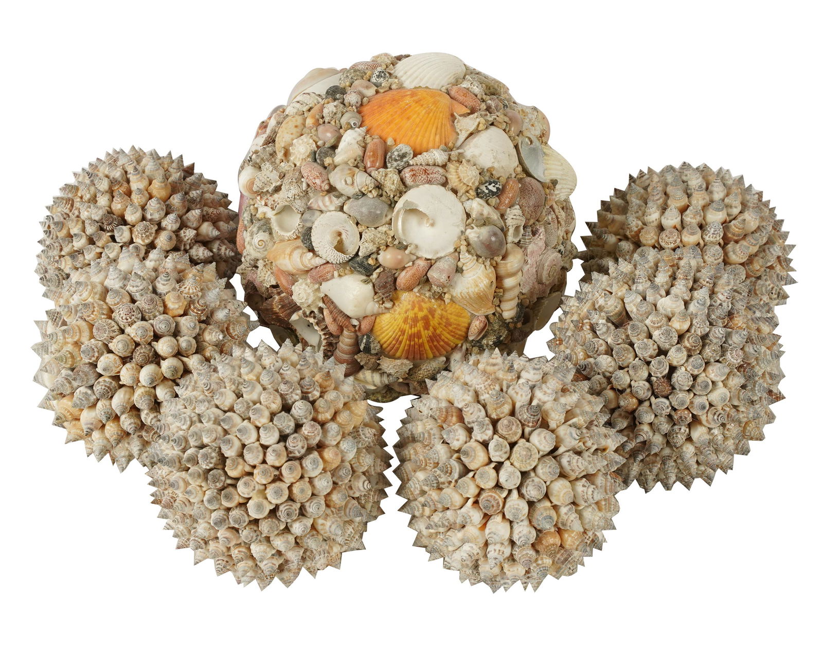 DON RICKLES GROUP OF SEVEN SHELL SPHERES: Condition: minor chips and losses; the largest: 10 inches diameter; the others: 5 inches diameter