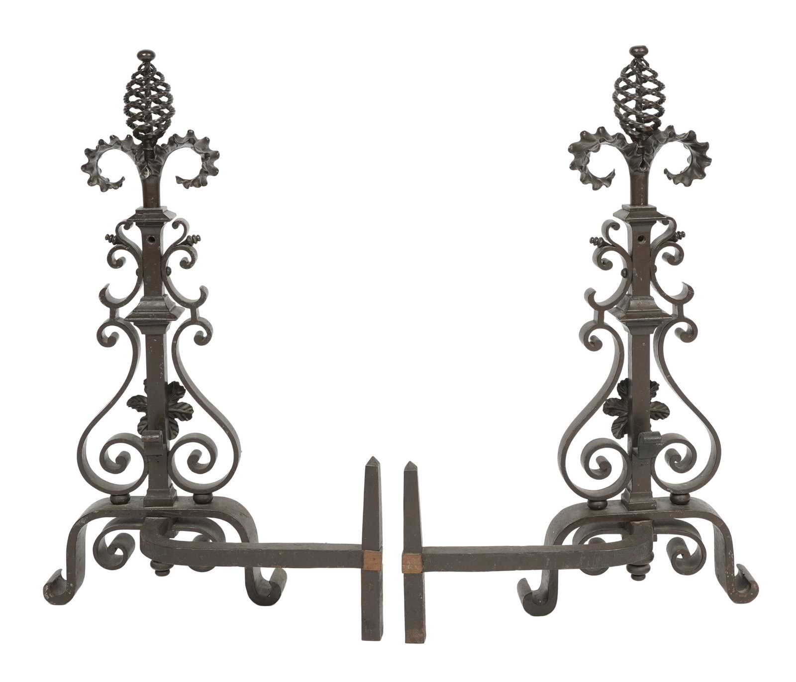 DON RICKLES PAIR OF PATINATED METAL ANDIRONS: with foliate and scrolled design; 15 inches wide; 5 inches deep; 24 inches high