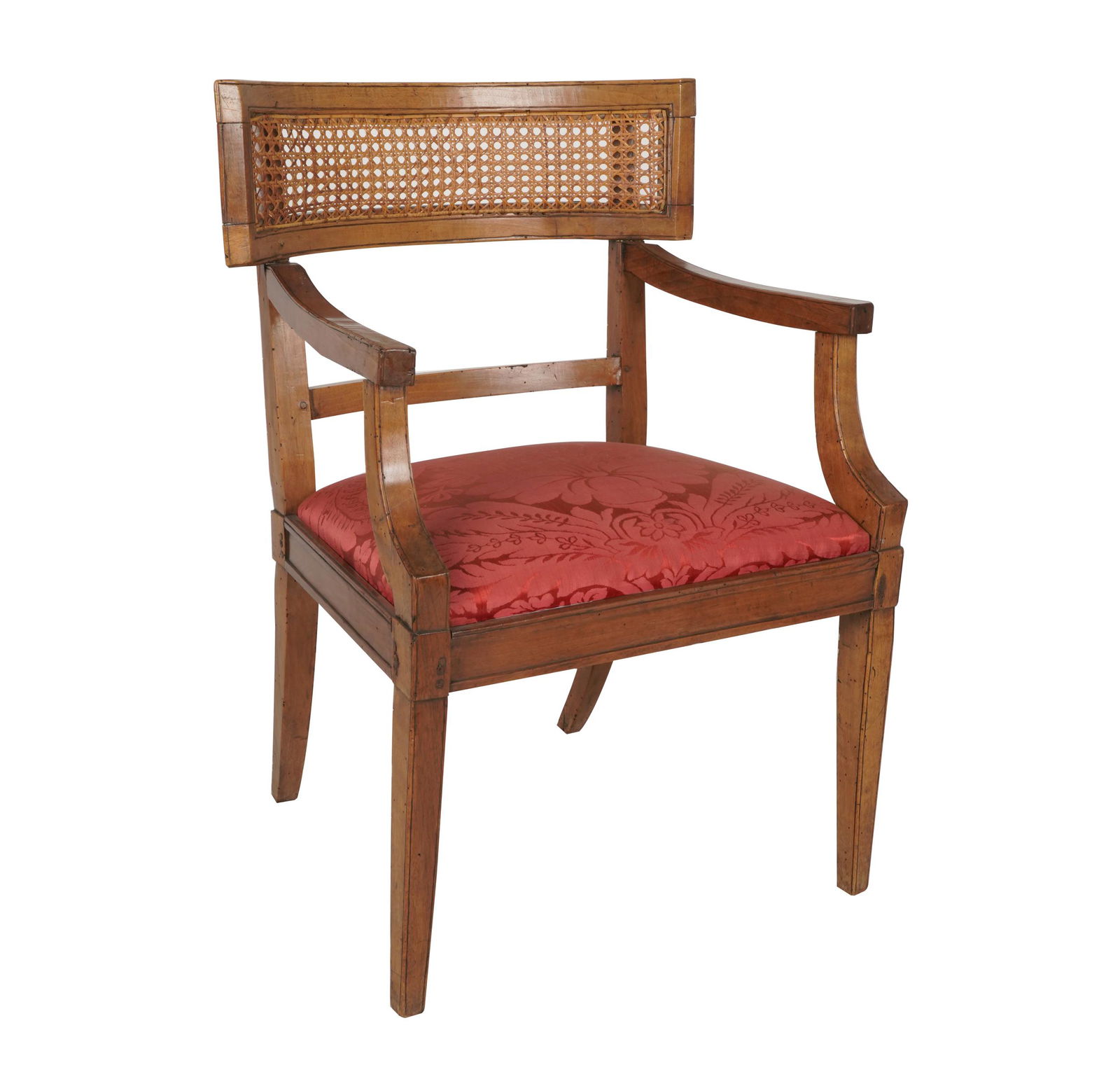 FRENCH NEOCLASSICALFRUITWOOD ARMCHAIR: the curved, caned backrest over a padded seat covered in red damask fabric; Provenance: The Jim Belushi Collection, a Michael Smith Installation; 24 inches wide; 20 inches deep; 34 inches high; seat h