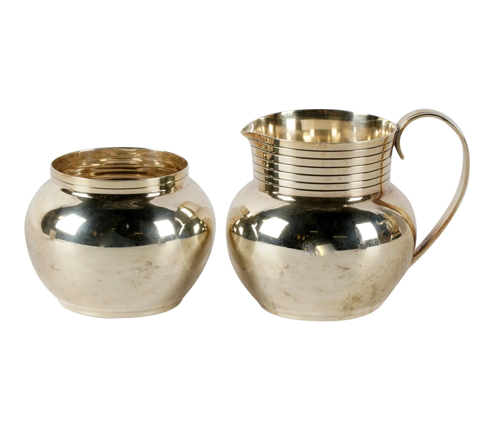 TIFFANY & CO. STERLING SUGAR & CREAMER: each with maker's mark, further marked "Sterling Silver" and numbered "25523"; approximately 306 grams total; not monogrammed; Provenance: The Estate of James and Lois Garner; proceeds will benefit Ch
