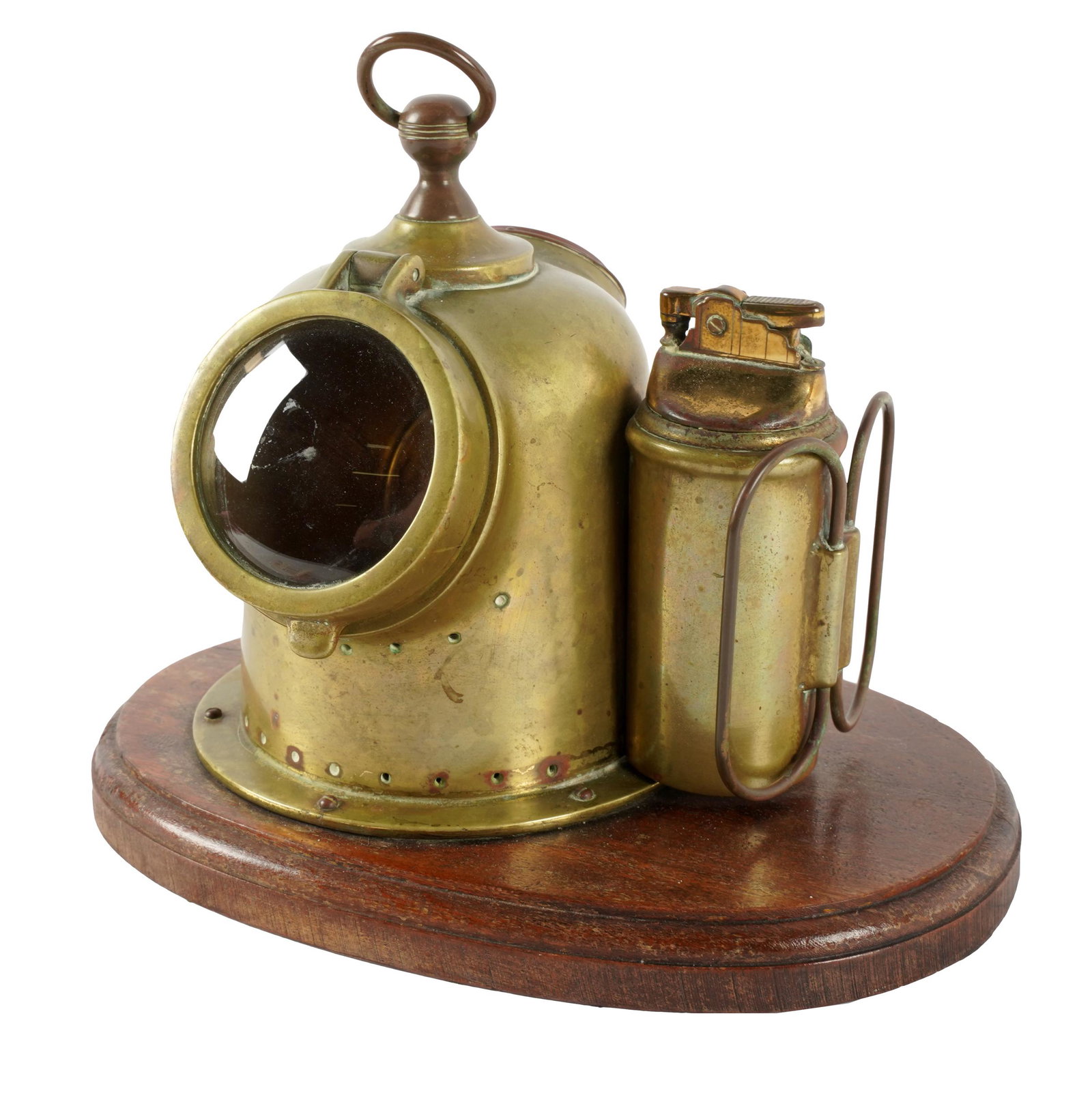BRASS NAUTICAL HUMIDOR & LIGHTER: with temperature gauge; mounted to an oval wooden base; 9 inches wide; 6 1/2 inches deep; 7 inches high