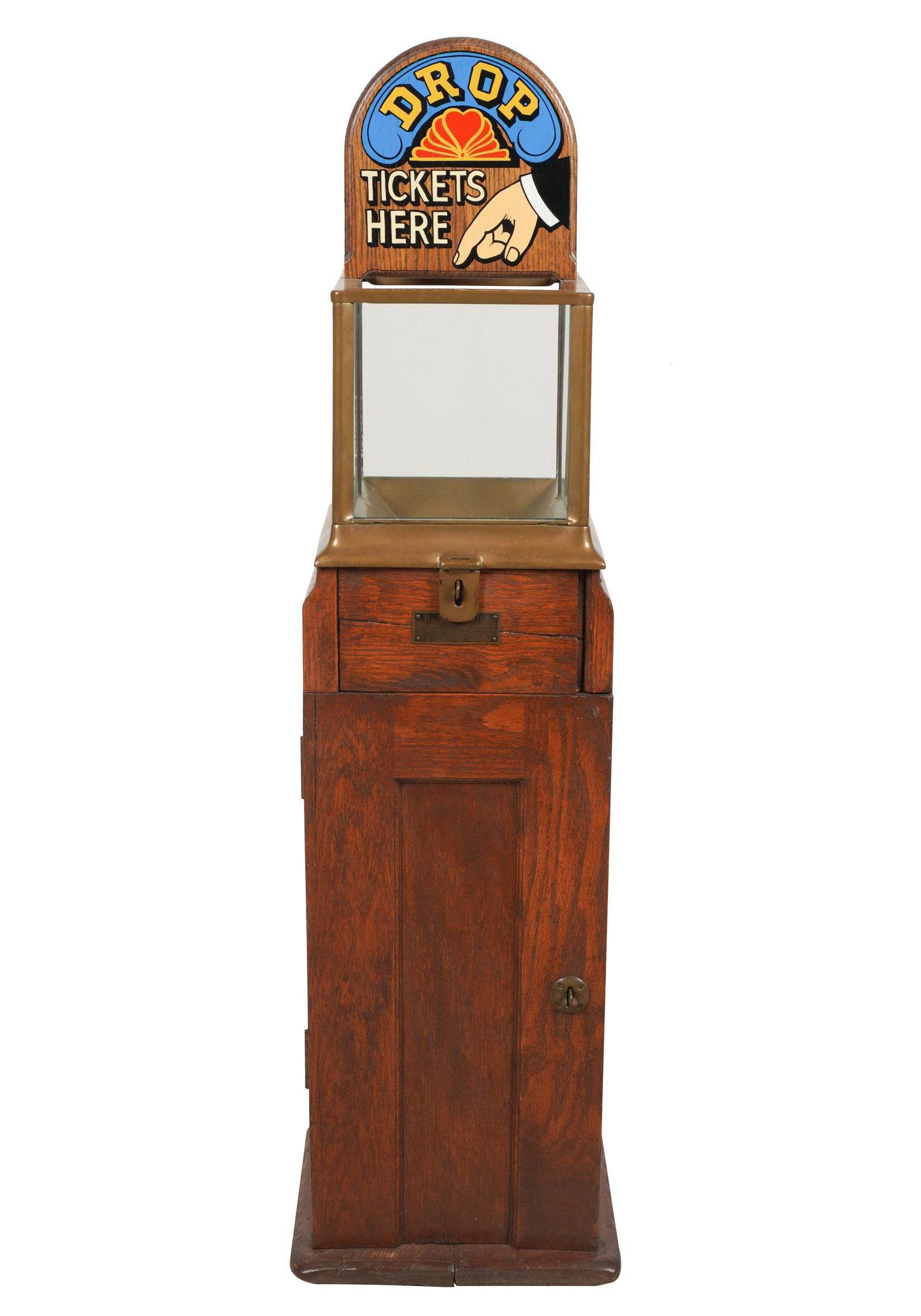COIN-OPERATED TURNSTYLE: H. V. Bright, Cleveland Ohio; glass and metal cabinet on oak pedestal base; with keys; Provenance: Personal Collection of Dustin Hoffman; 12 inches wide; 12 inches deep; 49 1/2 inches high