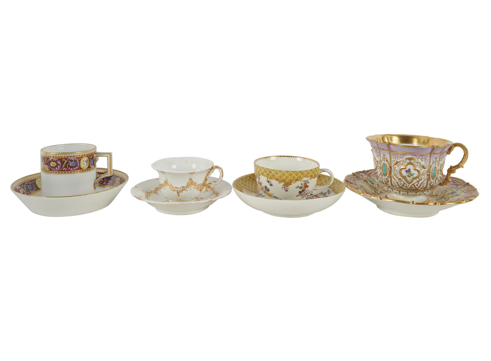 FOUR MEISSEN PORCELAIN CUPS & SAUCERS: each with blue crossed swords mark; the largest saucer: 6 inches diameter