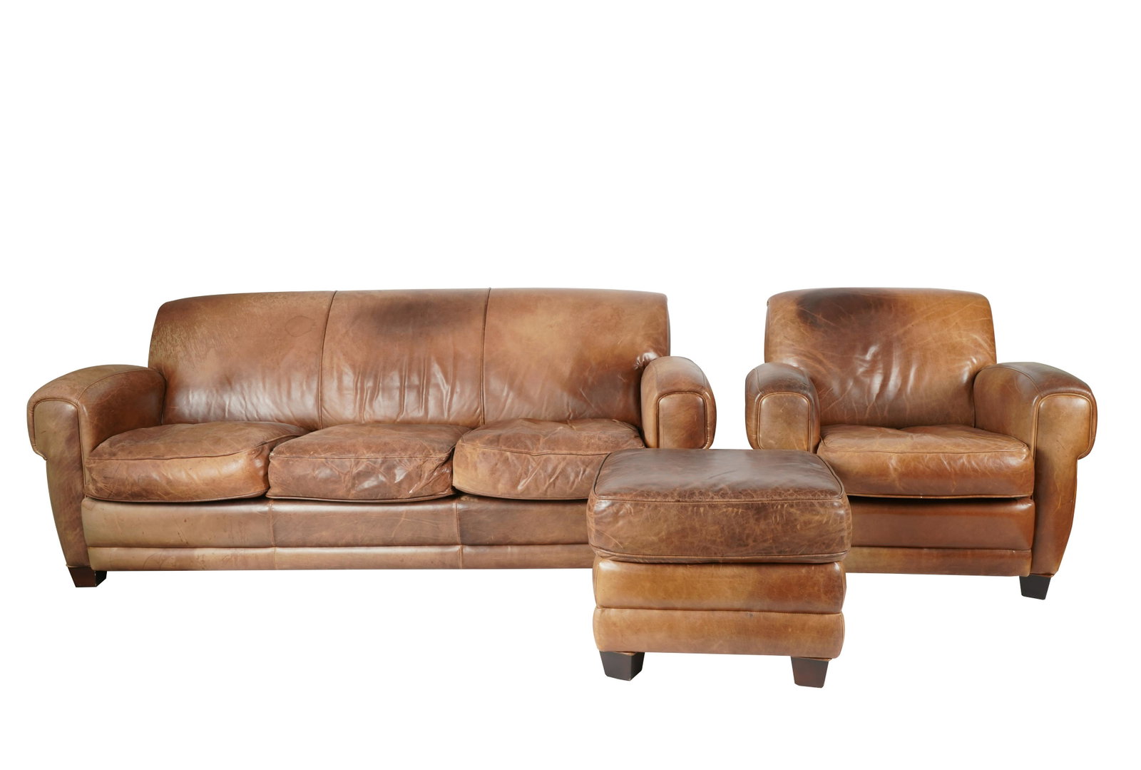 LEATHER LIVING ROOM SUITE: manufacturer unknown; comprising a sofa (82 inches wide; 32 inches deep, 33 inches high, seat height: 19 inches); a club chair (38 inches wide); and an ottoman (24 inches wide; 21 inches deep; 19 inch