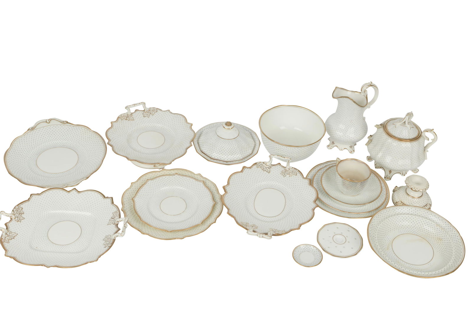 PORCELAIN SERVICE: unmarked; comprising 12 plates (9" dia.); 14 plates (8" dia.); 11 plates (7" dia.); 9 saucers (5 3/4" dia.); 1 teacup; 5 salt cellars (2 1/2" dia.); 1 candlestick (2 1/2" high); 1 covered sugar (7" hi