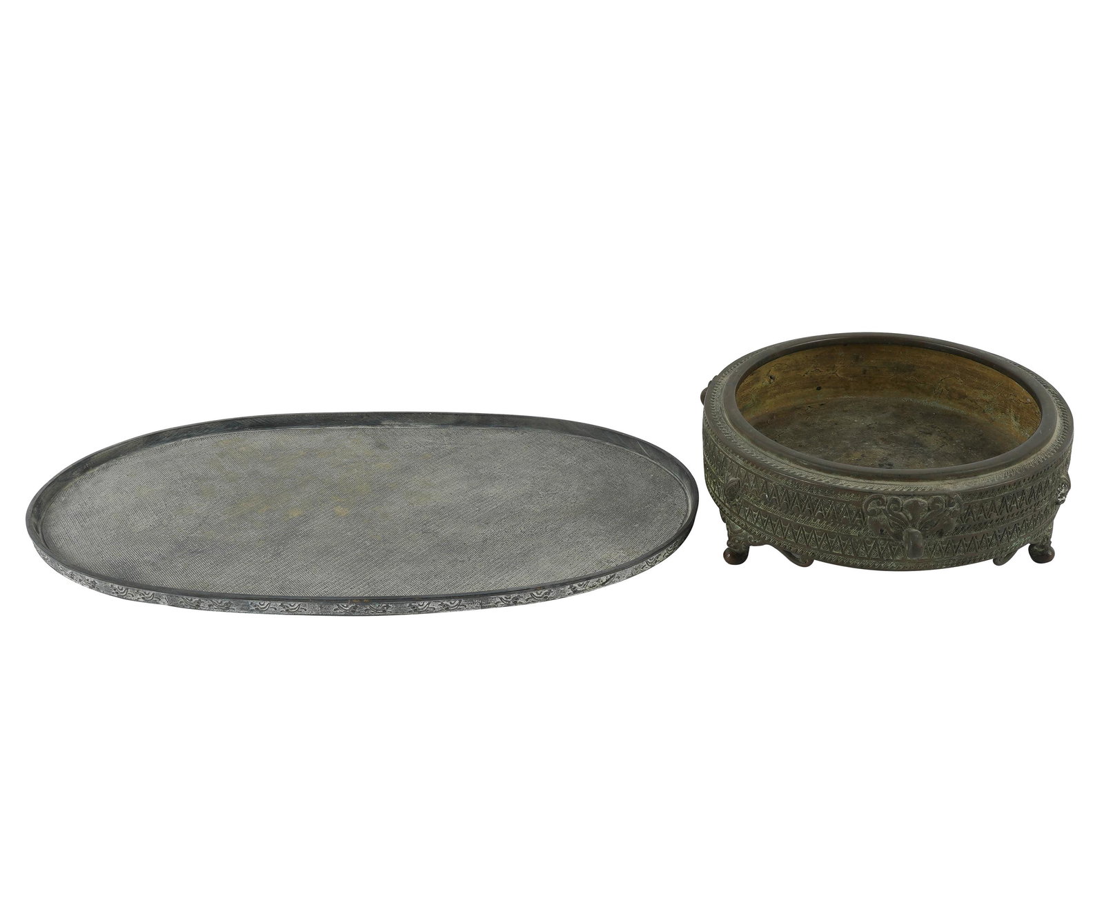 TWO JAPANESE BRONZE TABLEWARES: comprising and oval tray (21 1/2 x 11 1/2 inches) and a footed bowl (12 inches diameter)