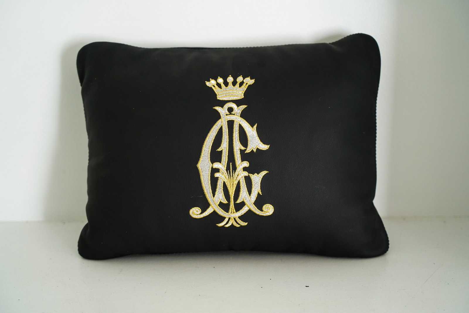 CHRISTIAN AUDIGIER MONOGRAMMED BLACK LEATHER PILLOW: CHRISTIAN AUDIGIER MONOGRAMMED BLACK LEATHER PILLOW15 x 10 1/4 inches