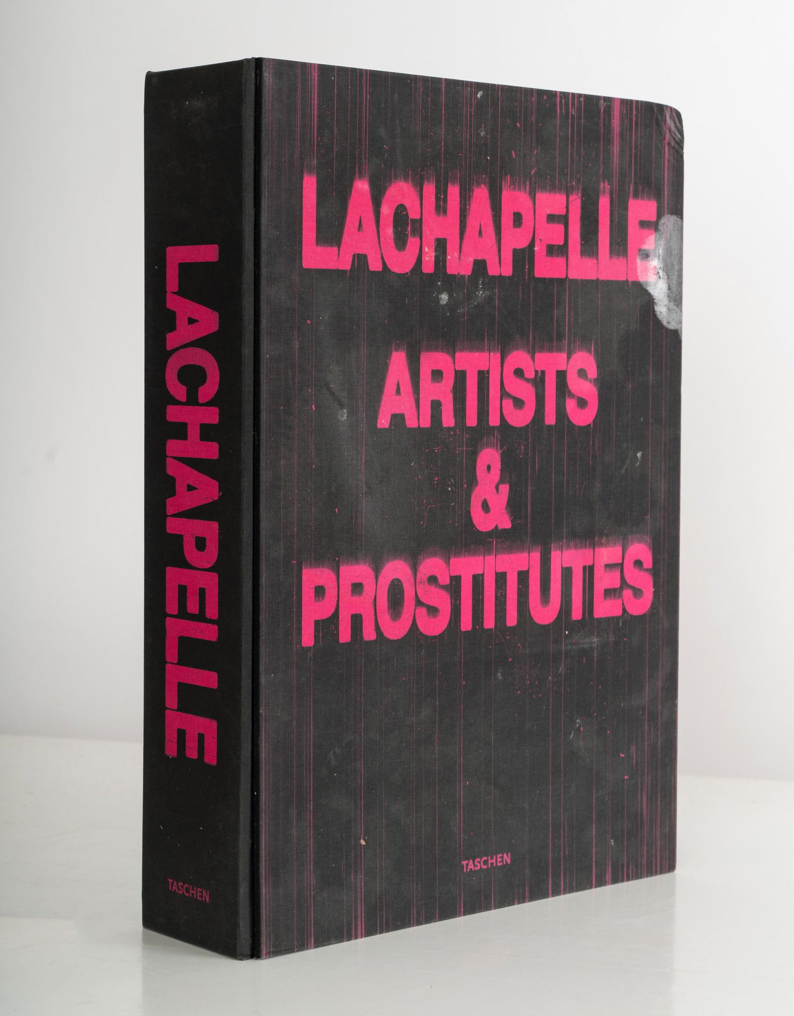 CHRISTIAN AUDIGIER "LACHAPELLE ARTISTS & PROSTITUTES": Signed in blue marker by David LaChapelle on the limitation page. Published by Taschen. Number 799 of the limited edition. With paperback supplement.the clamshell: 15 1/2 x 21 3/4 x 4 inches