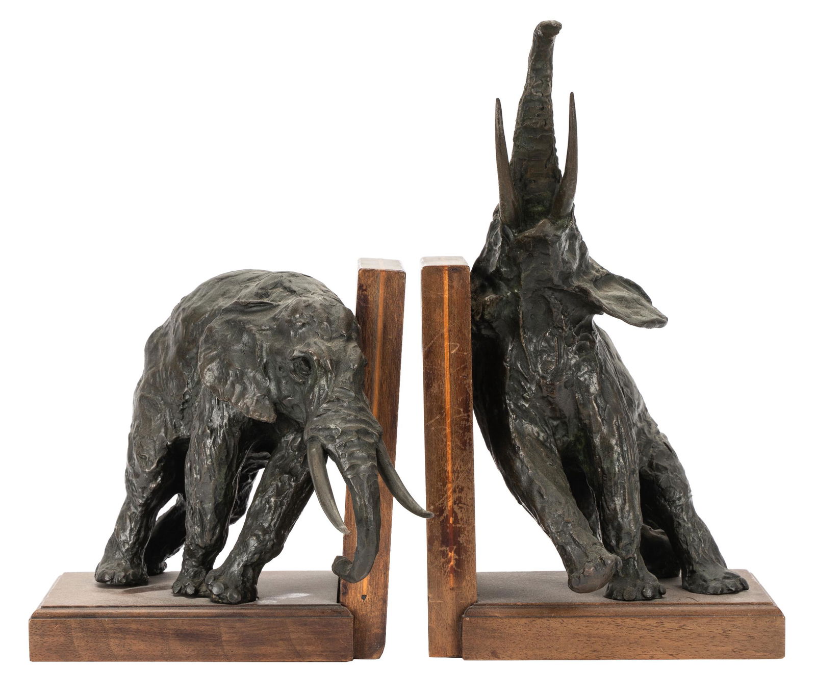 ARY JEAN LEON BITTER (1883 - 1973): ELEPHANT BOOKENDS: bronze with green patination, mounted to wooden bases; inscribed to plaque "Ary Bitter / Susse Fres. Edrs. Paris"; 6 1/4 inches wide; 7 and 11 inches high respectively