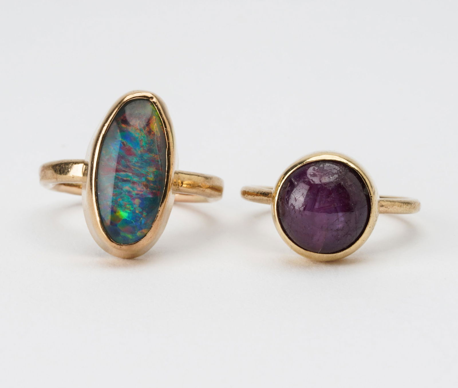 TWO 10 KARAT YELLOW GOLD & GEM-SET RINGS (1 of 5)