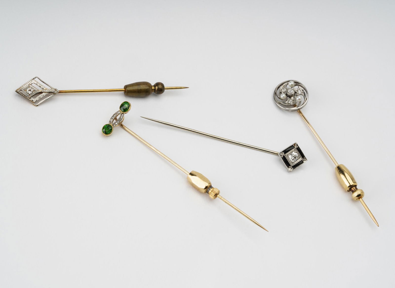 GROUP OF FOUR GEM-SET STICKPINS (1 of 8)