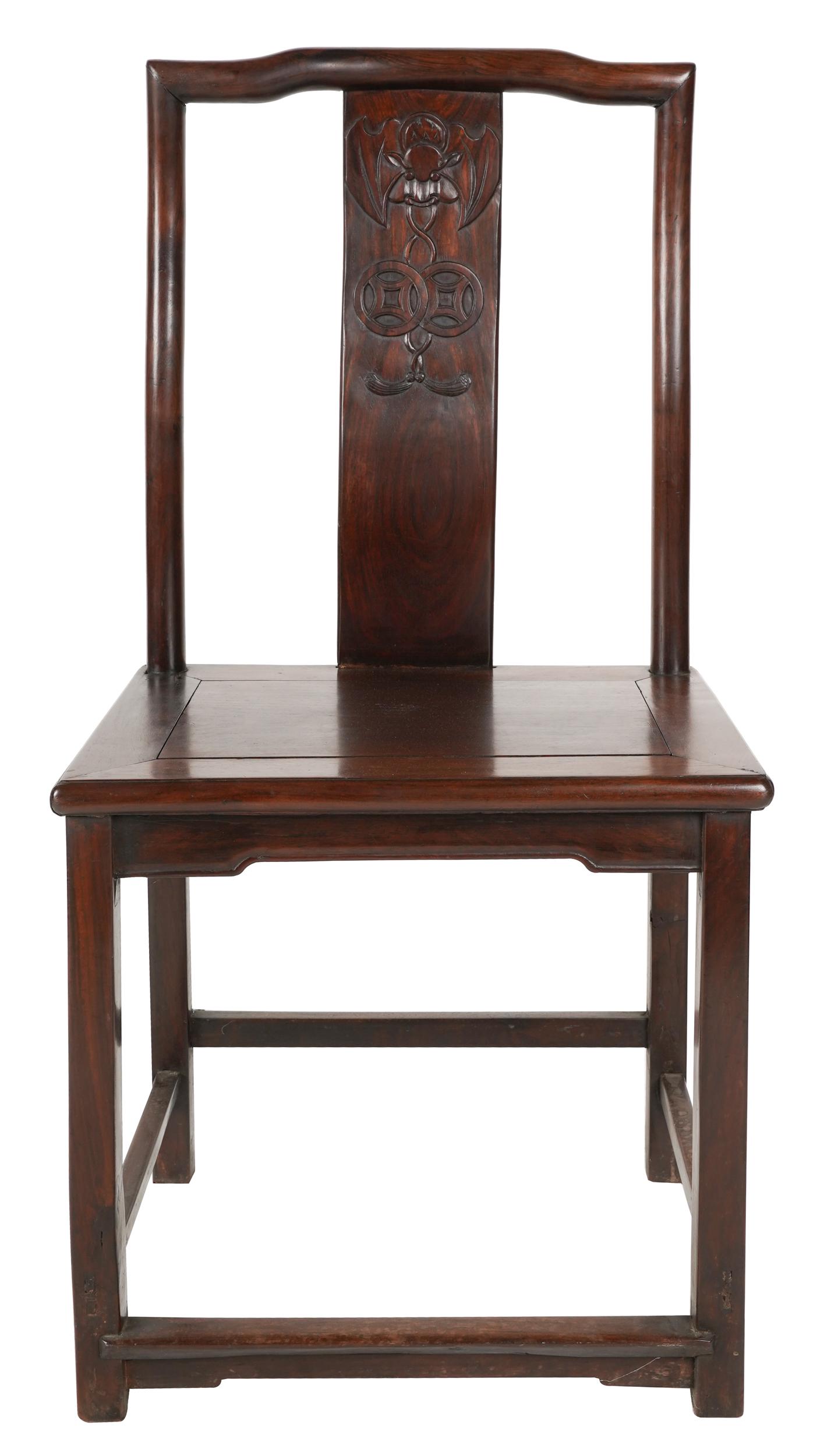 CHINESE HARDWOOD SIDE CHAIR: with bat and coin-carved splat; 20 1/2 inches wide; 1 1/2 inches deep; 41 inches high; seat height: 20 1/2 inches